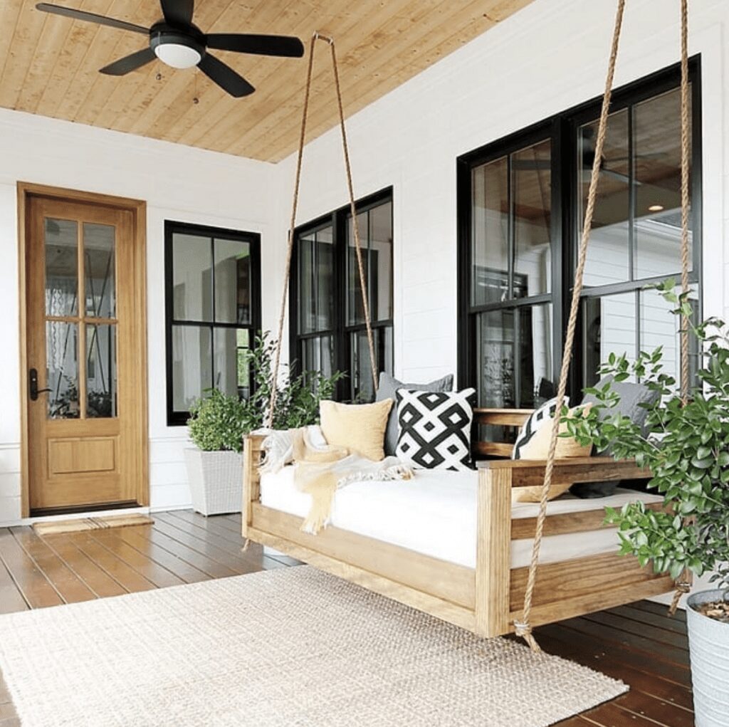 25 Dreamy Farmhouse Porches That Stun in 2025 3 Screenshot 2024 05 15 at 2.02.41 PM