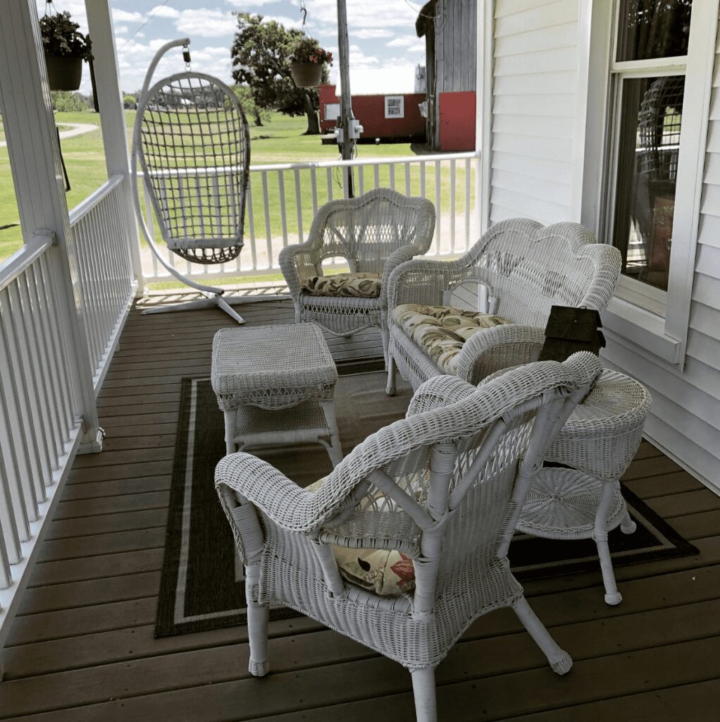 25 Dreamy Farmhouse Porches That Stun in 2025 15 Screenshot 2024 05 15 at 2.07.18 PM