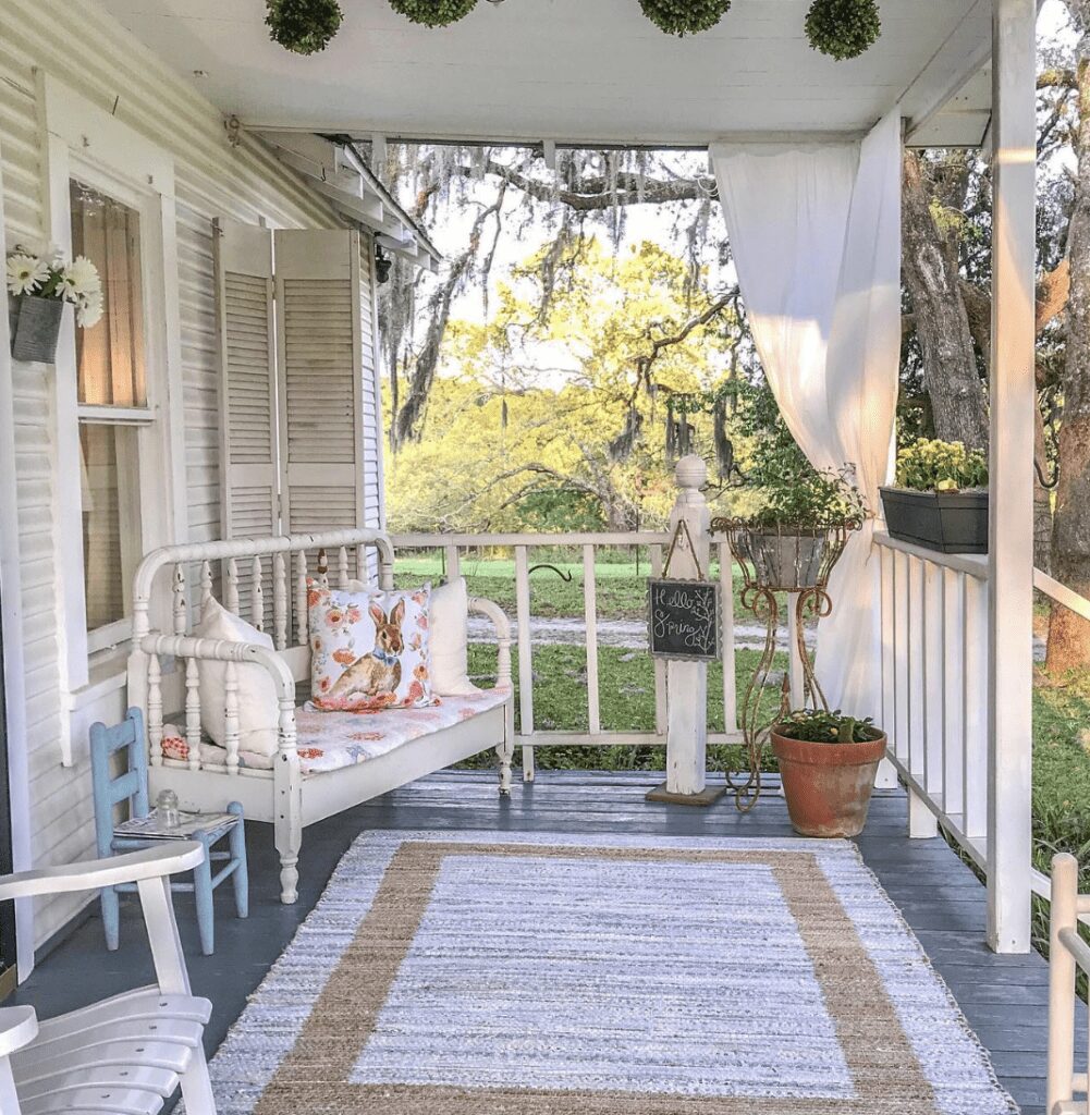 25 Dreamy Farmhouse Porches That Stun in 2025 19 Screenshot 2024 05 15 at 2.08.23 PM