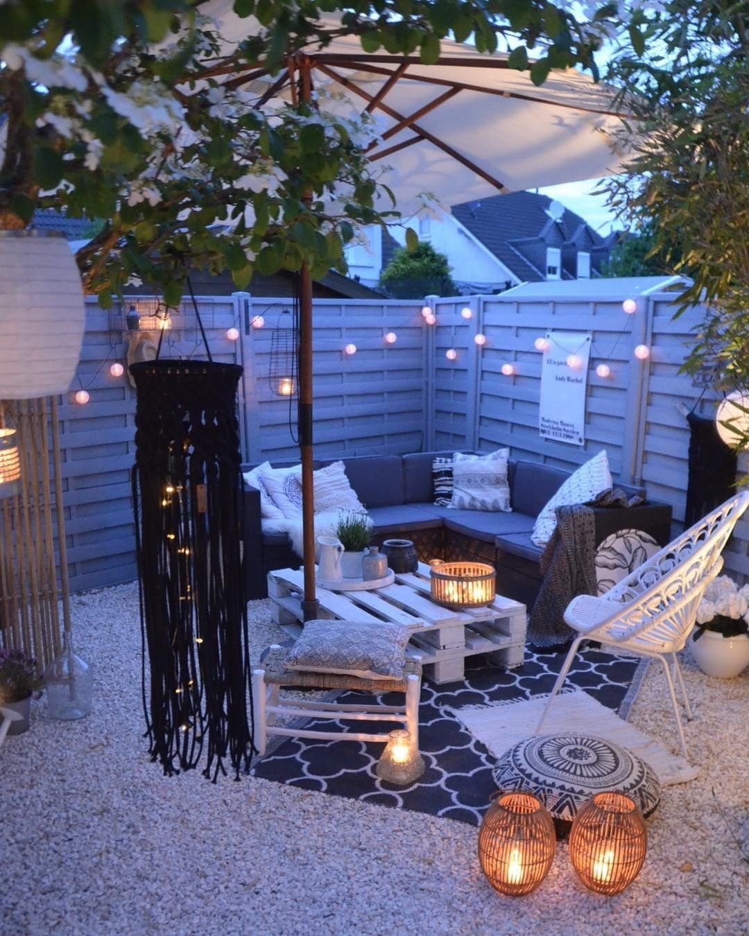 24 Stunning Boho Patio Ideas That Wow in 2025 5 Nocturnal Elegance with a Boho Twist