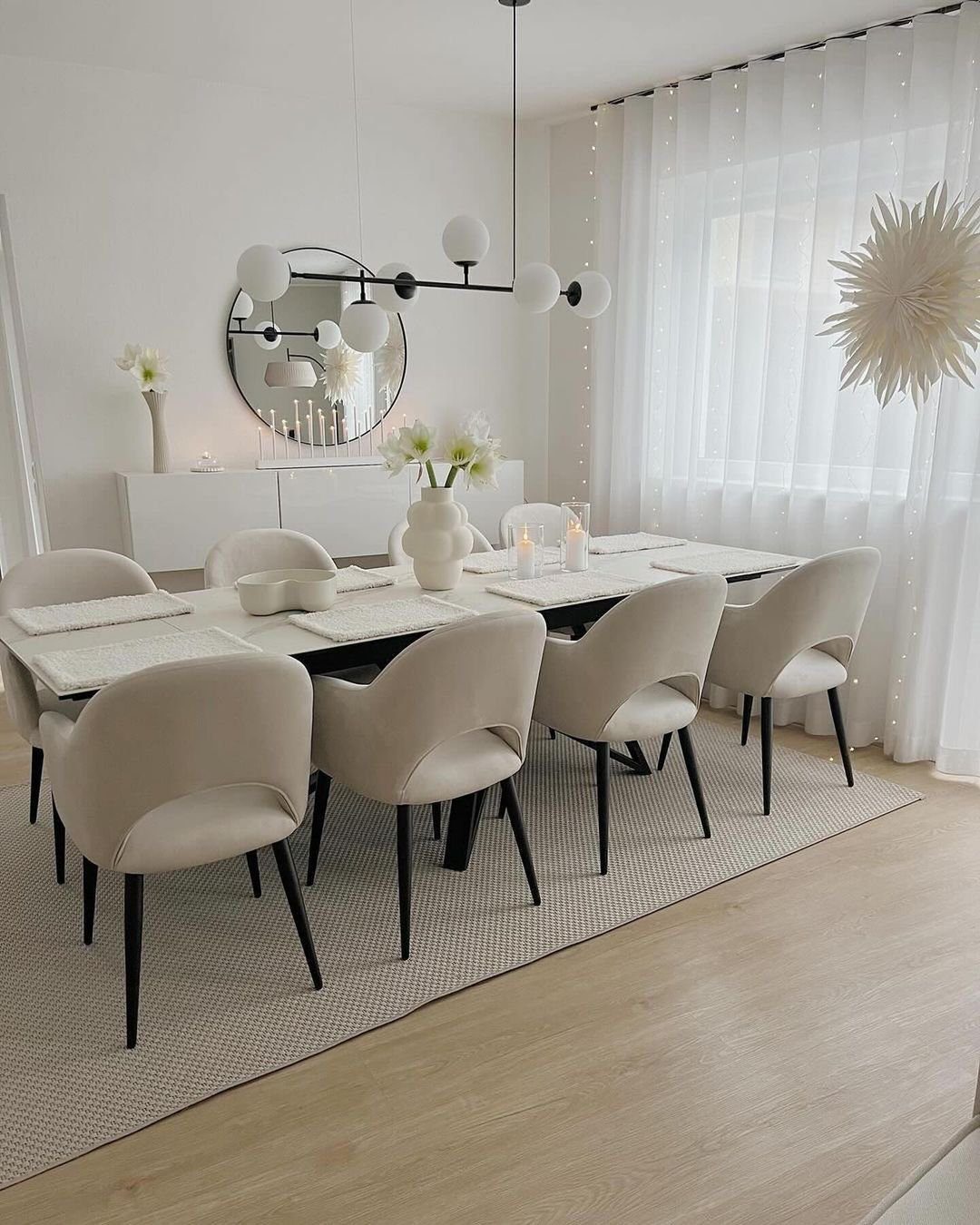 Stunning Mirrors That Transform Dining Rooms in 2025 21 Minimalist Dining Room with Round Mirror