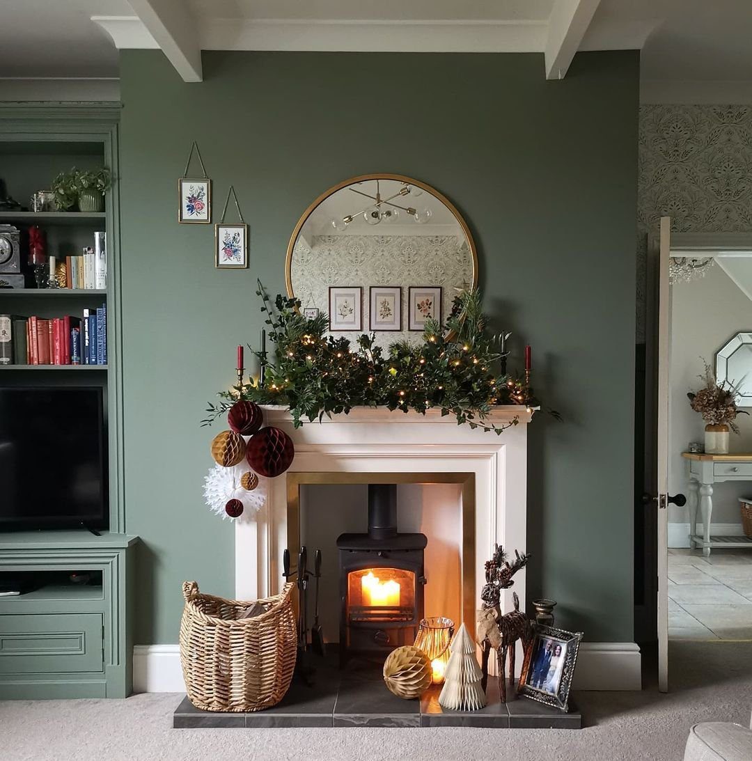 25 Jaw-Dropping Christmas Mantle Garlands for 2025 13 Warm Glow and Earthy Greens