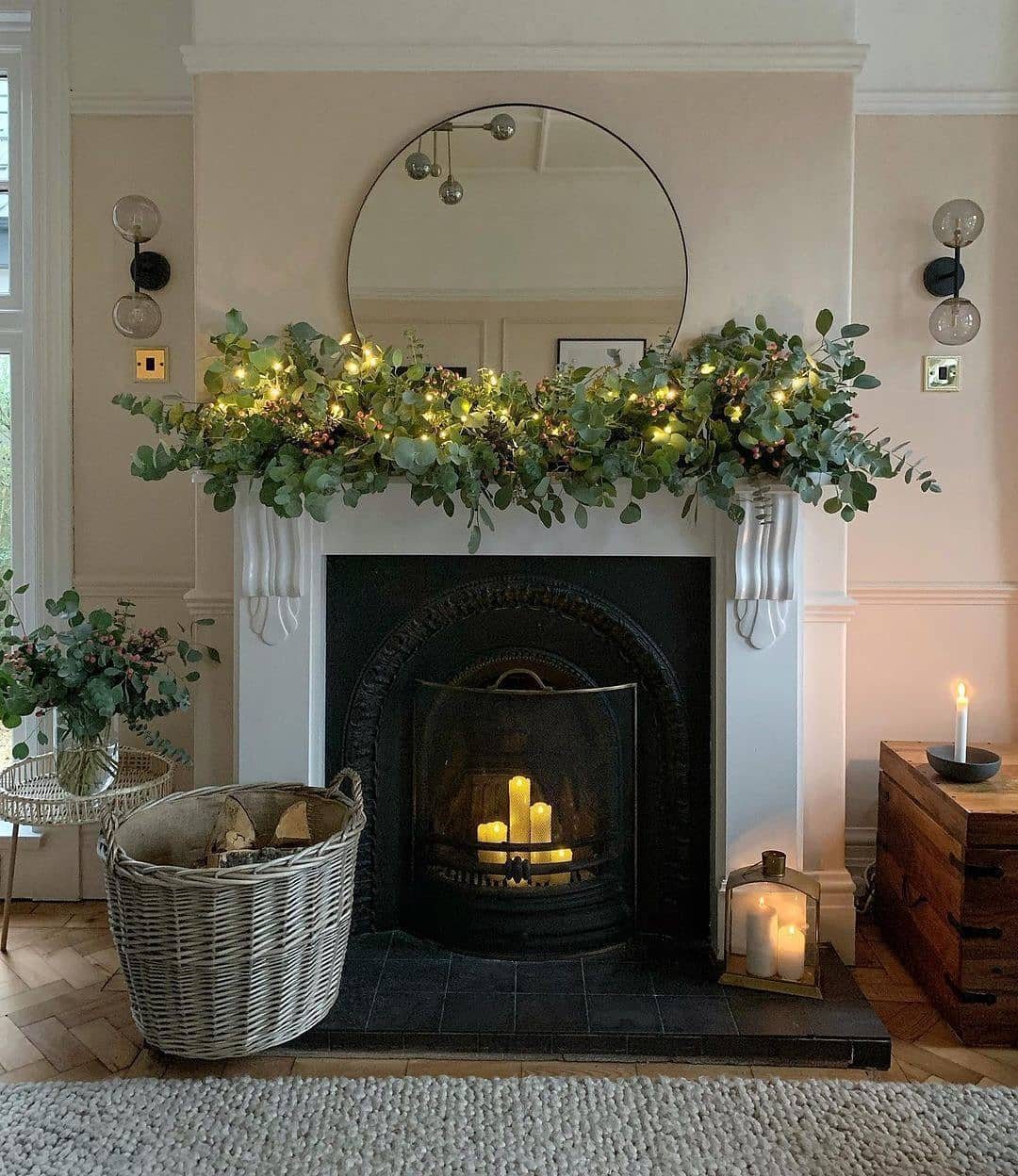 25 Jaw-Dropping Christmas Mantle Garlands for 2025 17 17. Eucalyptus Glow and Candlelight