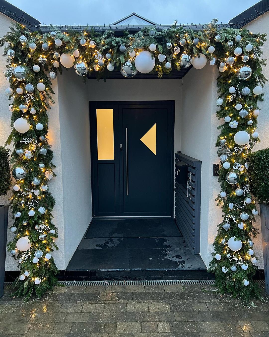 Stunning Christmas Door Garlands to Wow in 2025 5 5. Modern Frosted Elegance