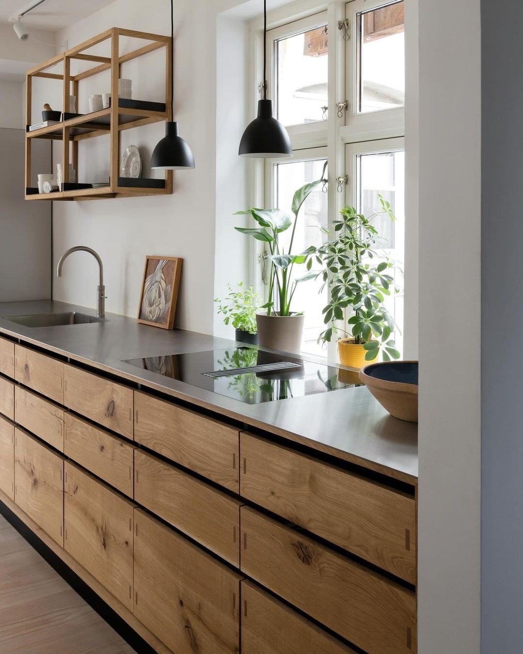 20 Jaw-Dropping Black & Oak Kitchens for 2025 14 Scandinavian Simplicity: Wood and Light Harmony