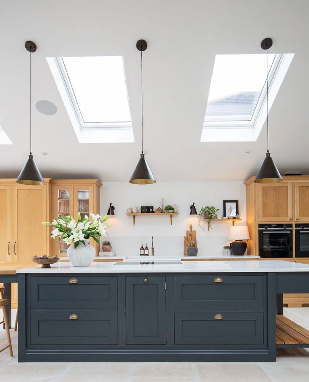 20 Jaw-Dropping Black & Oak Kitchens for 2025 3  Bright and Bold: Skylit Elegance