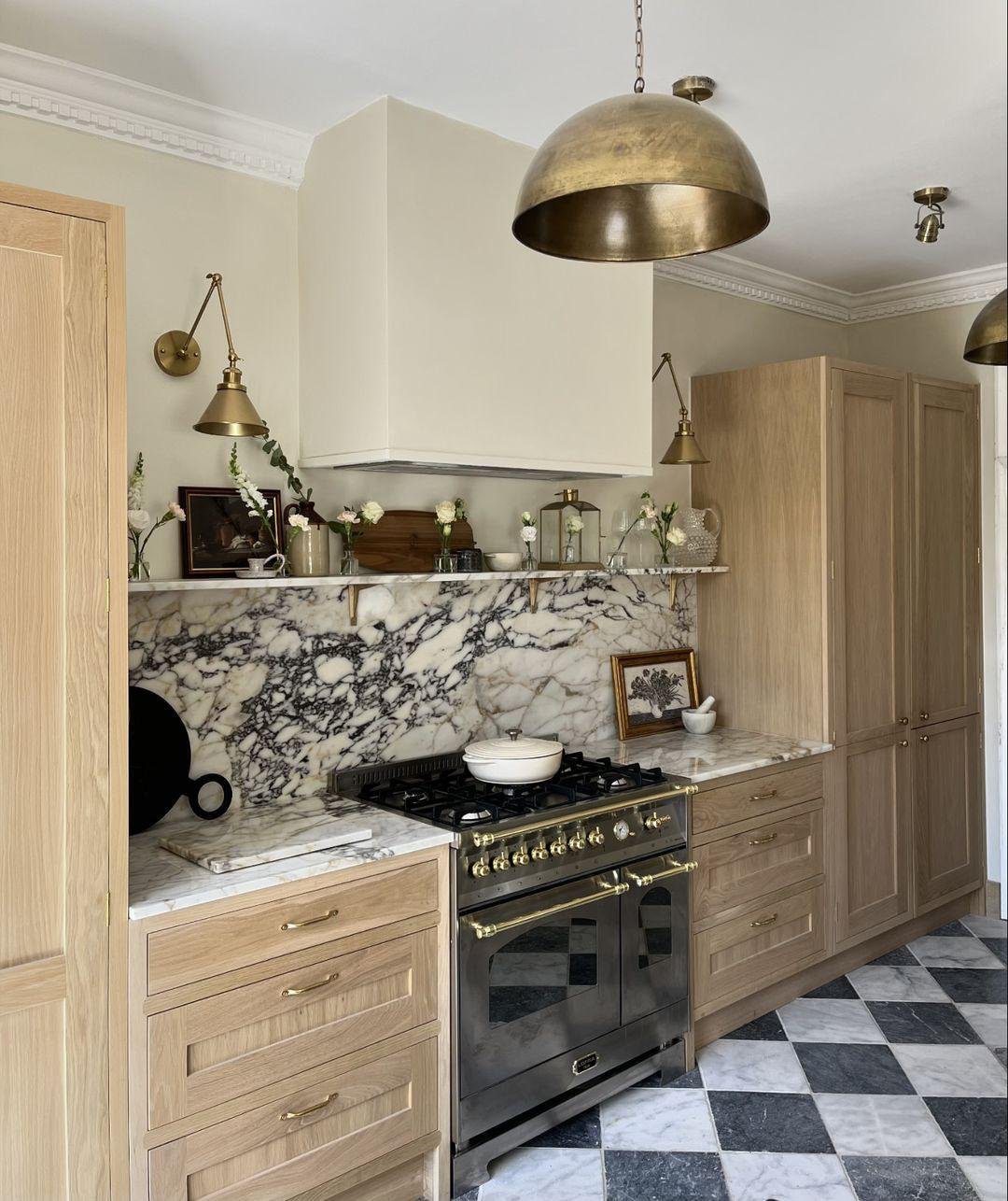 20 Jaw-Dropping Black & Oak Kitchens for 2025 8 Classic Elegance: Brass and Marble Touches
