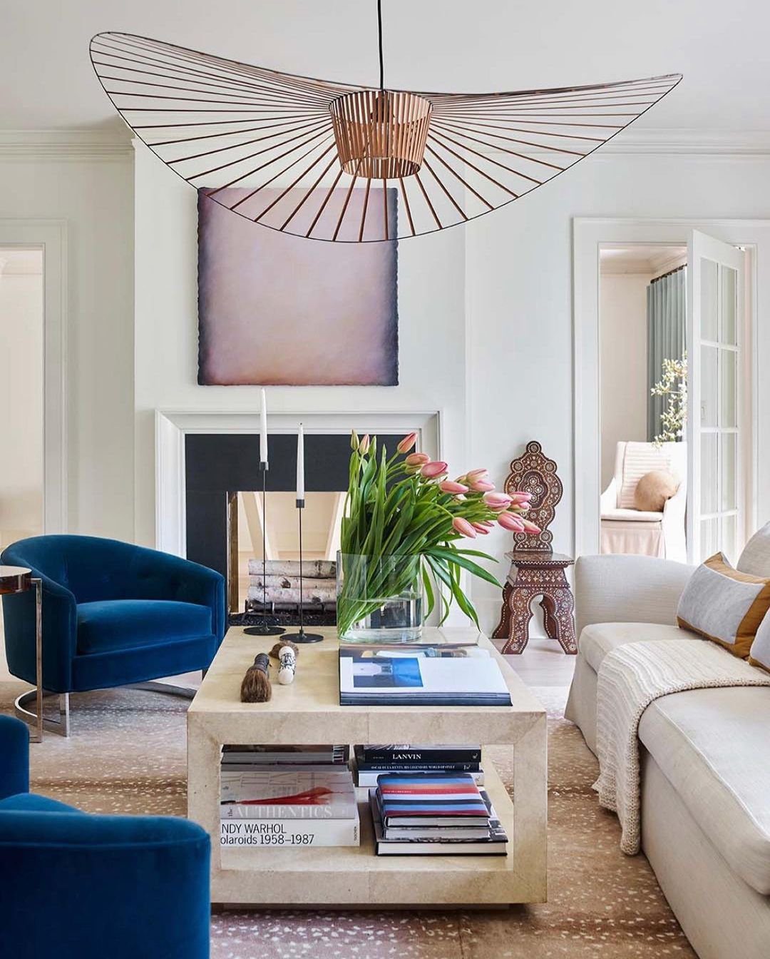 Jaw-Dropping Jewel Tone Living Rooms for 2025 13  Sculptural Sophistication