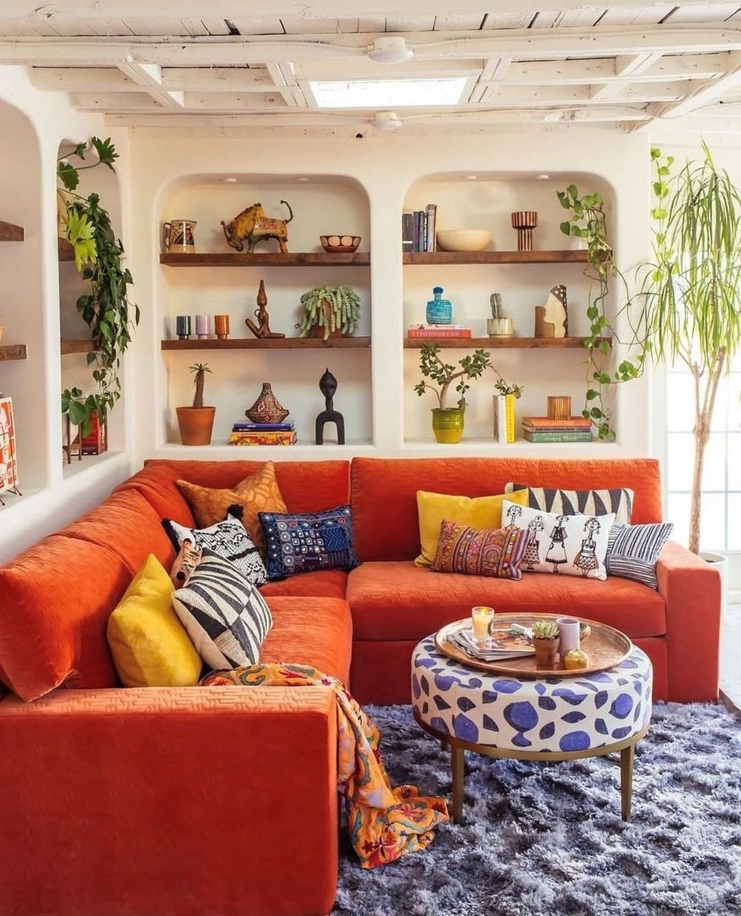 25 Jaw-Dropping Orange Couch Ideas for 2025! 1 Bold Orange Couch With Global Flair
