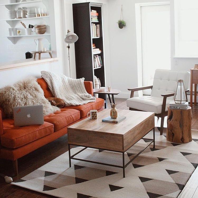 25 Jaw-Dropping Orange Couch Ideas for 2025! 22 Cozy Minimalism With A Bold Sofa
