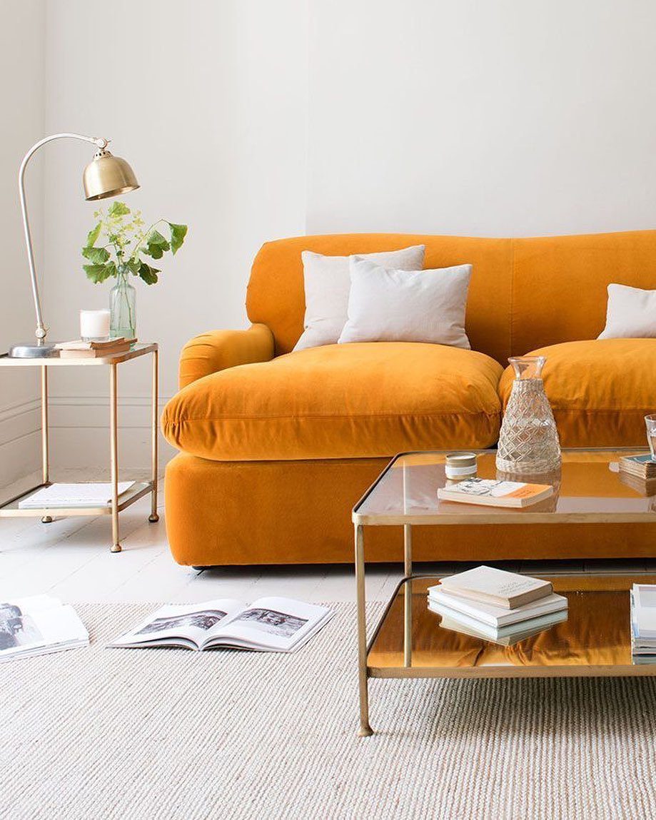 25 Jaw-Dropping Orange Couch Ideas for 2025! 25 Minimalist Chic With A Cozy Pop