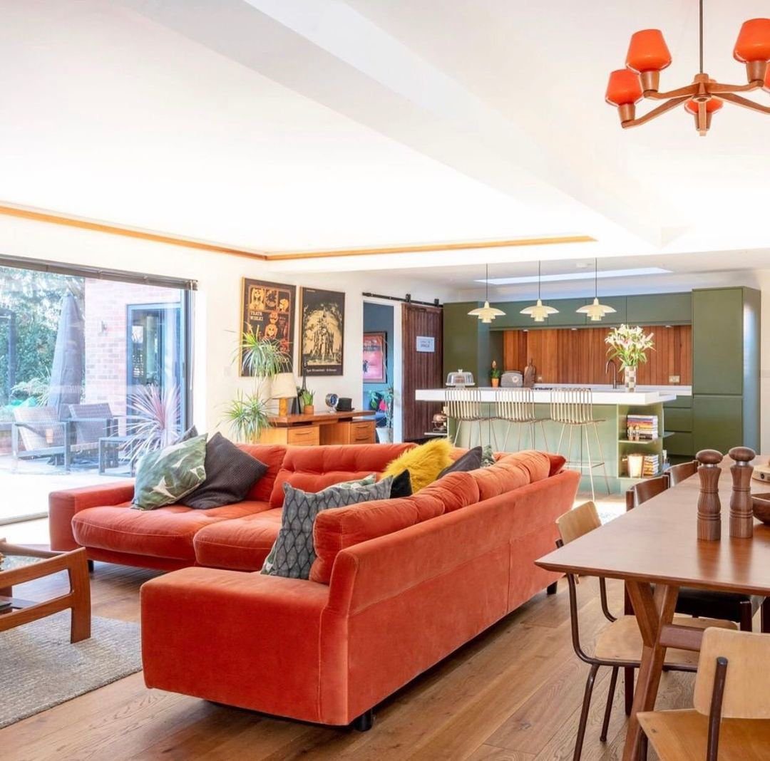 25 Jaw-Dropping Orange Couch Ideas for 2025! 2 Retro Warmth With An Orange Couch