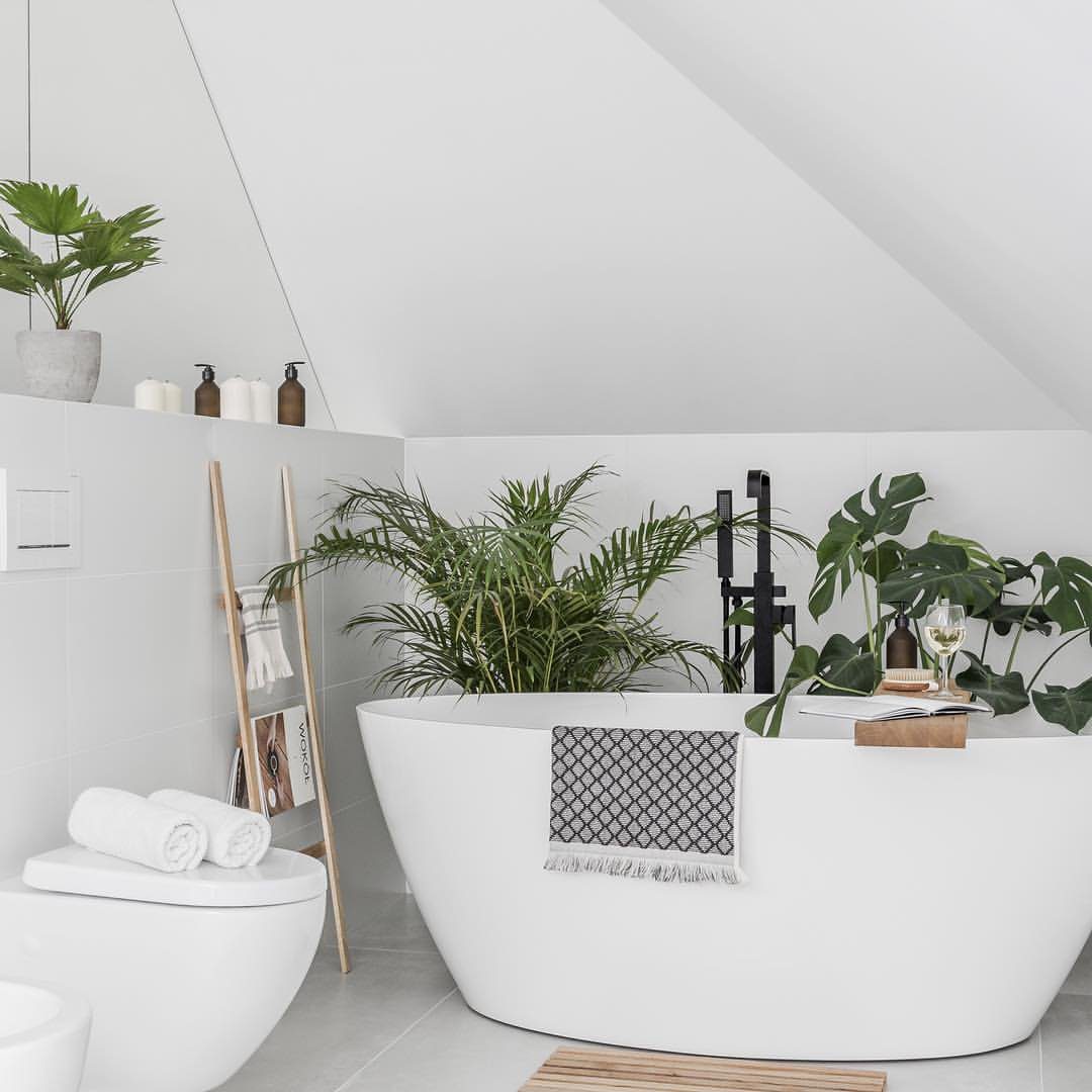 Stunning Attic Bathroom Designs to Die For in 2025 5 Minimalist Haven With Tropical Touches