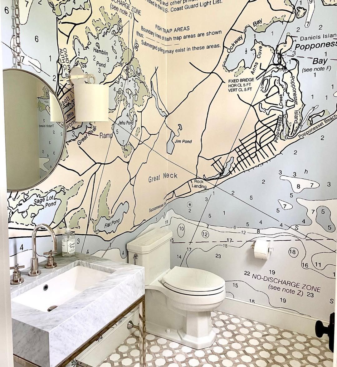 15 Dreamy Nautical Bathroom Trends for 2025 11 Coastal Maps As Statement Wall Decor
