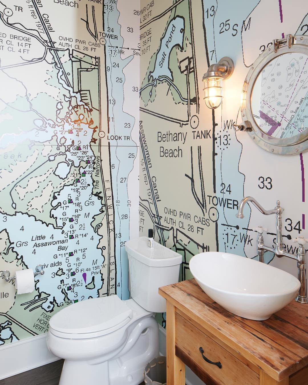 15 Dreamy Nautical Bathroom Trends for 2025 15 Map Murals Meet Rustic Coastal Nautical Bathroom Decor