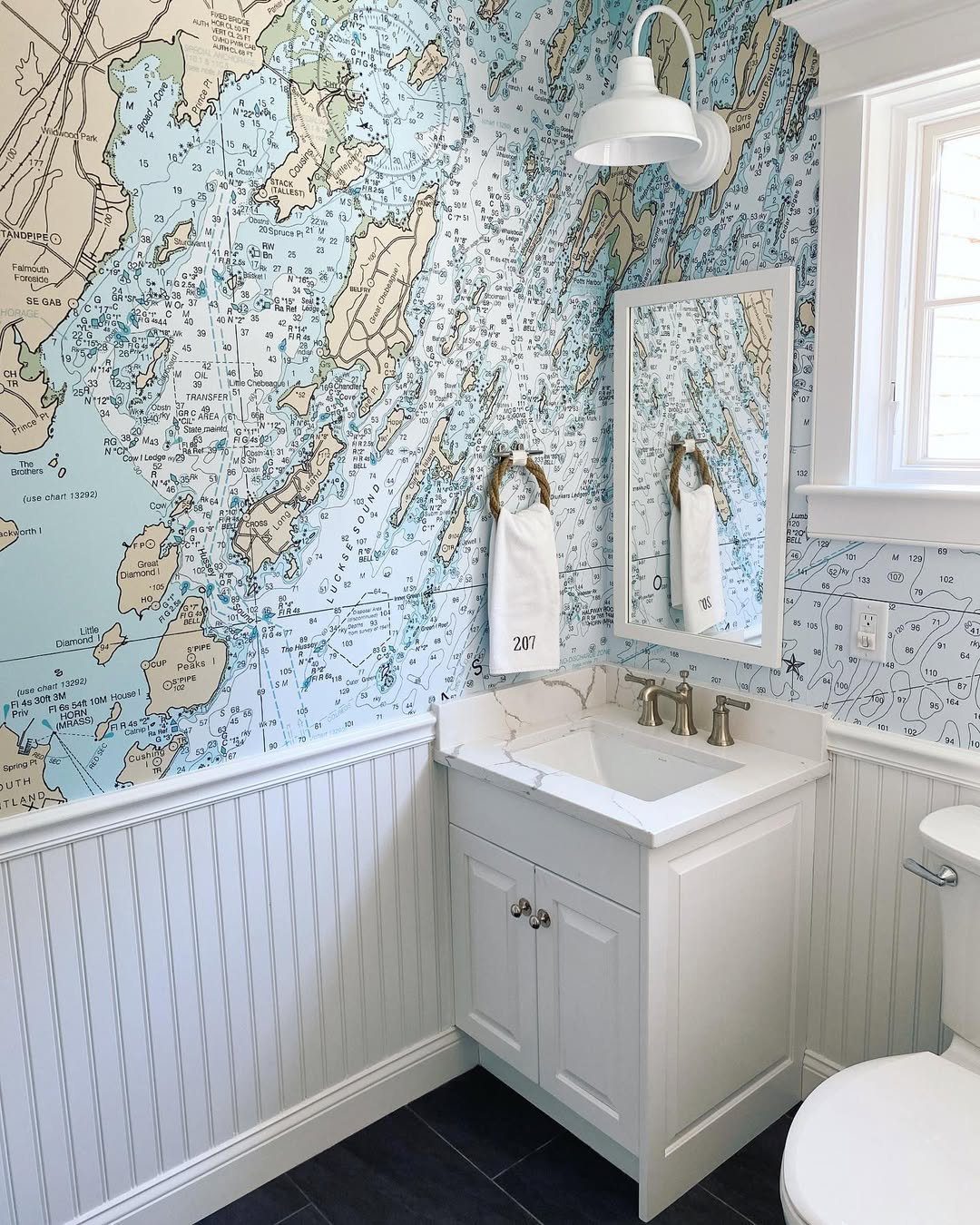 15 Dreamy Nautical Bathroom Trends for 2025 9 Explore Coastal Style With Maps - Nautical Themed Bathroom Decor Ideas