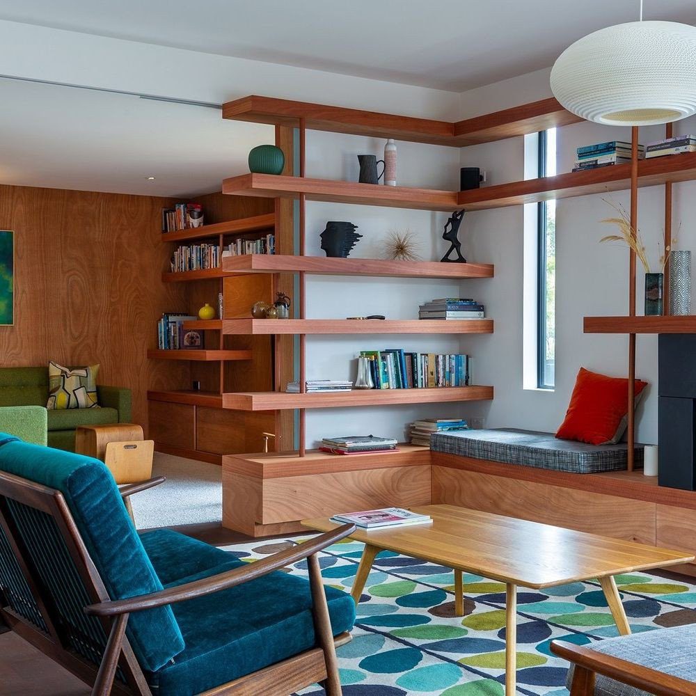 Jaw-Dropping Mid Century Living Rooms for 2025 14 Floating Shelves And Bold Mid-Century Hues