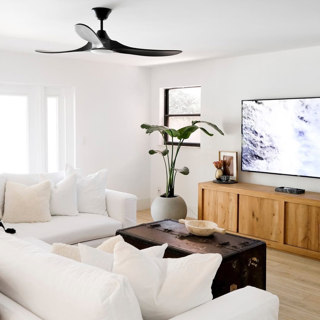 Jaw-Dropping Ceiling Fans for 2025 Living Rooms 17 Sculptural Black Ceiling Fan For Contrast