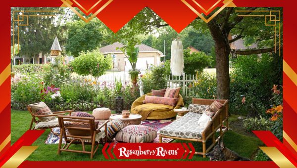 Bohemian-style patio with colorful hammocks, rattan chairs, and vibrant textiles