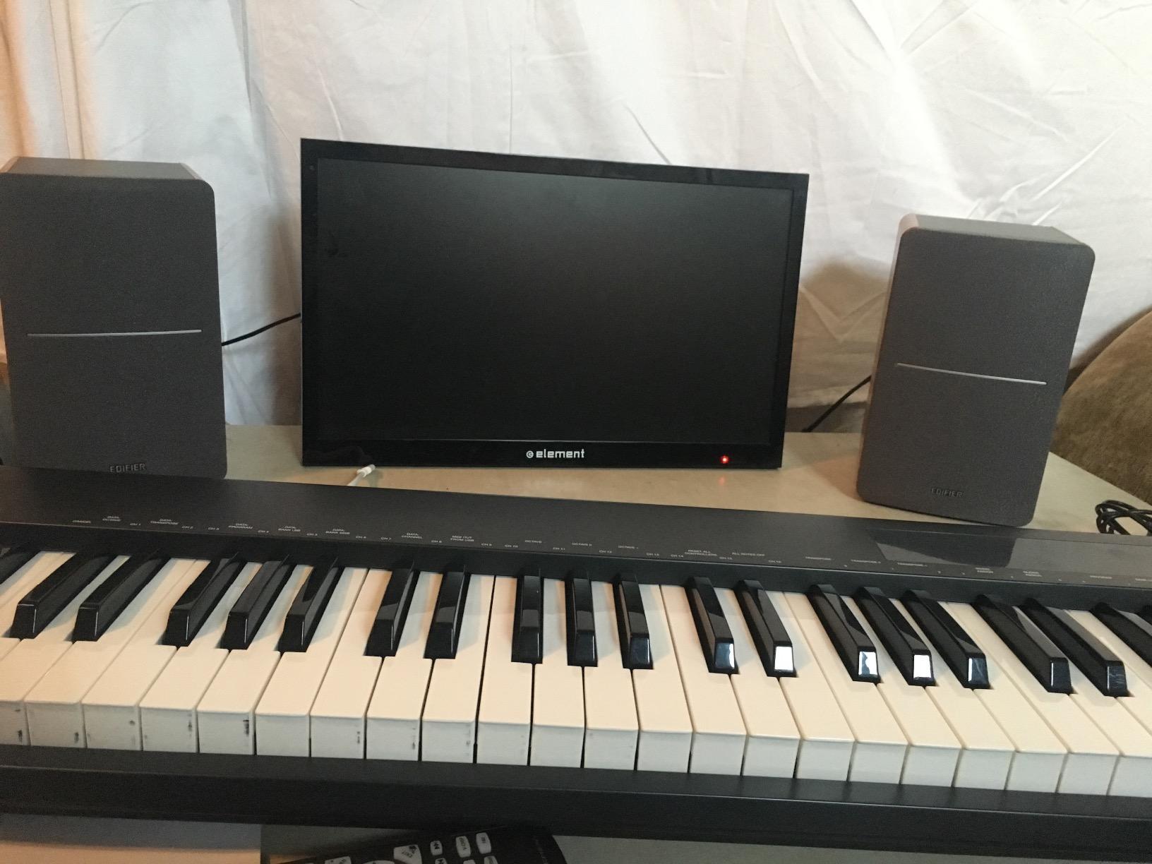 Edifier R1280T Powered Bookshelf Speakers - 2.0 Active Near Field Studio Monitor Speaker - Wooden Enclosure - 42 Watts RMS Power - Customer Photo 2