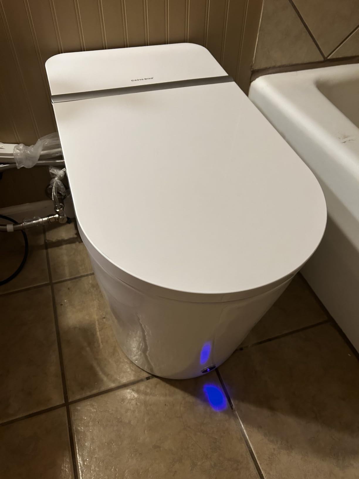 Casta Diva Smart Toilet, Wider Bidet with Heated Seat, Auto Open/Close, Warm Water, Foot Sensor Auto Flushing, Modern Japanese Toilet for Bathroom with Remote Control 1.28GPF(CD-K010) - Customer Photo 1
