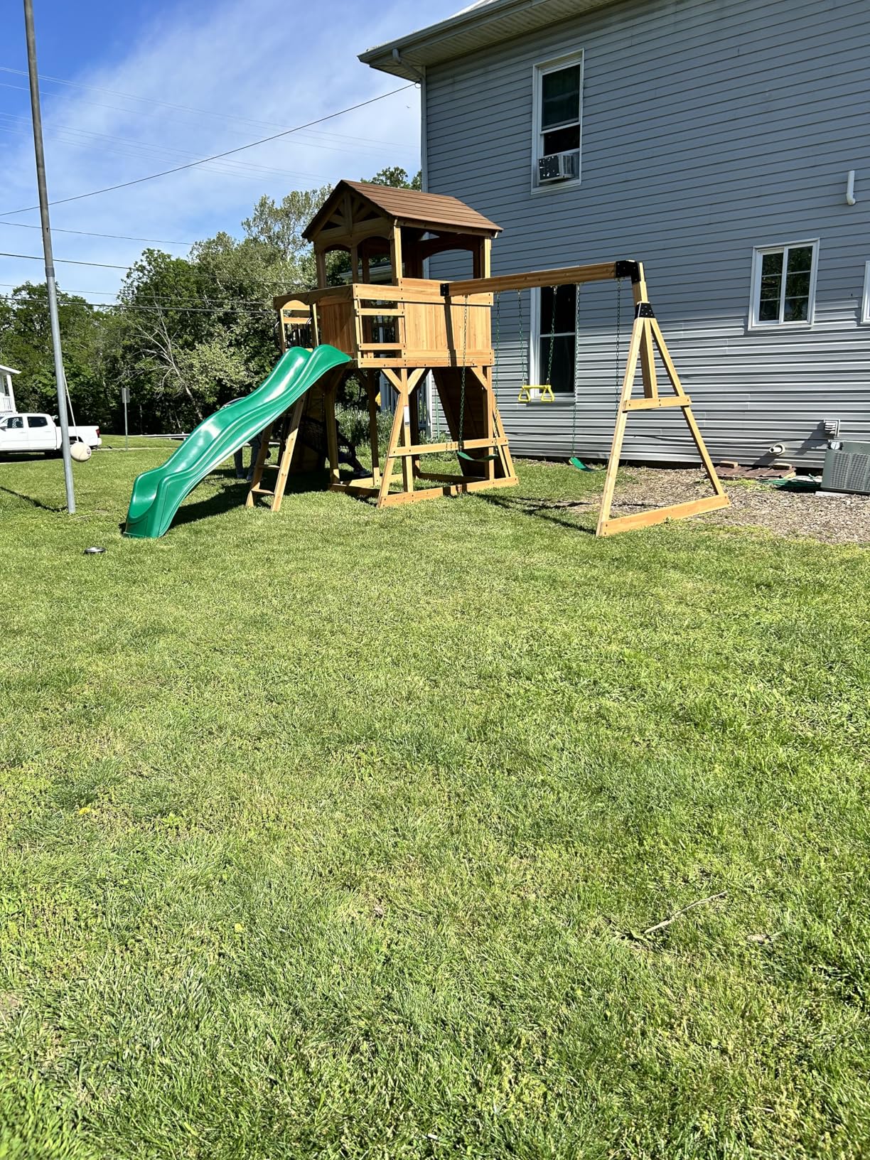 Backyard Discovery Sterling Point Cedar Wood Swing Set with Wave Slide, Raised Clubhouse, Wooden Bridge, Rock Wall, Belt Swings, Web Swing, Trapeze, Balcony, Climbing Wall, Ladder, Outdoor Playset - Customer Photo 1
