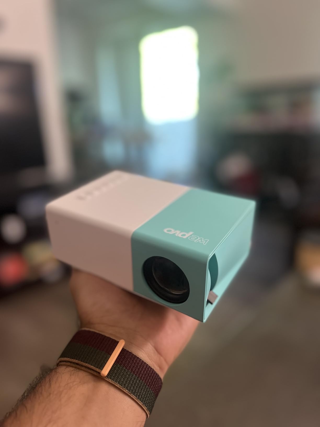 Projector Mini Portable Outdoor Movie Projectors, LED Pico Video Projector for Home Theater Film Projectors, Compatible with Smartphone/ Tablet/ Laptop/ TV Stick/ PS/ USB - Customer Photo 1