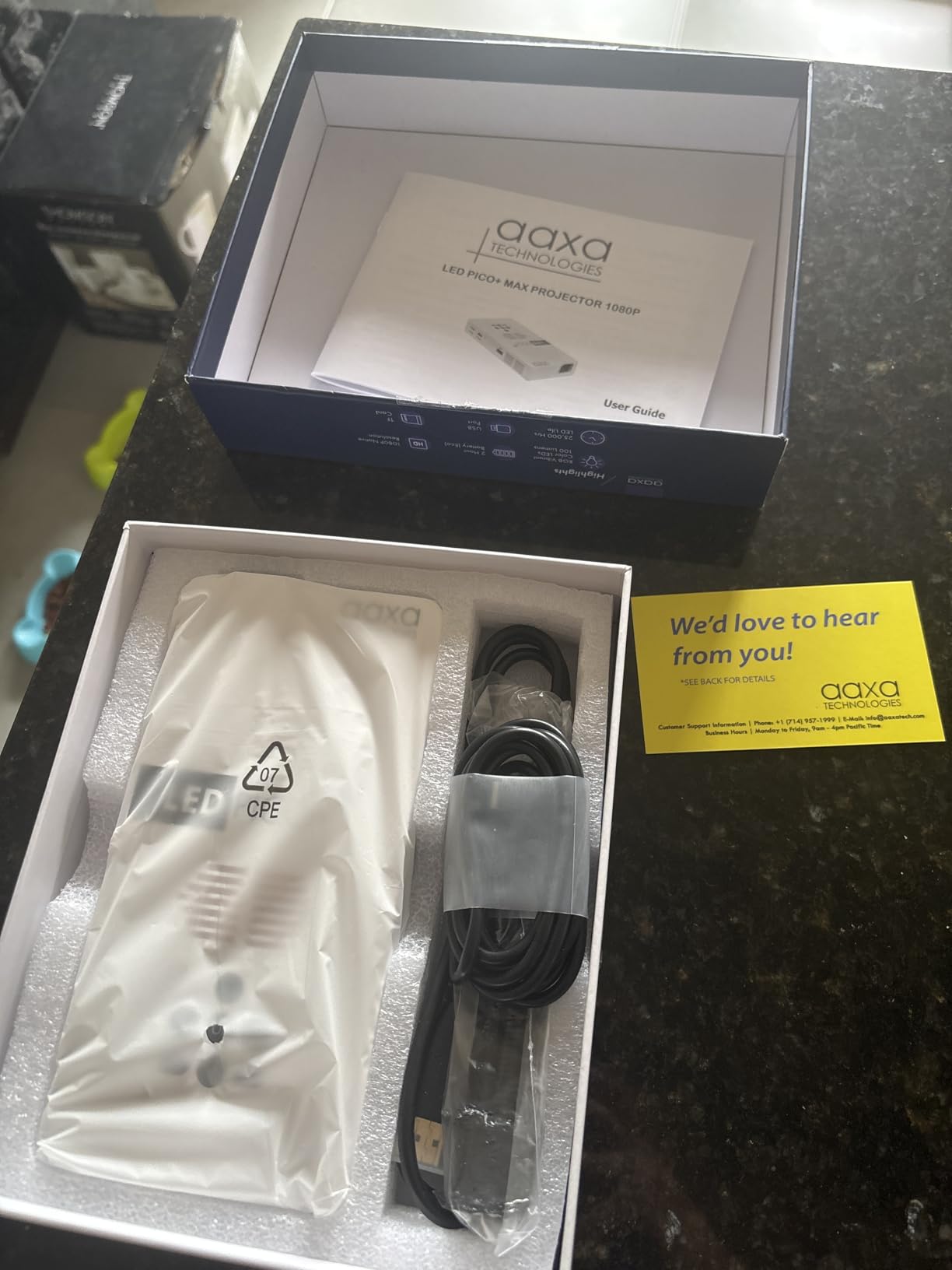 AAXA LED Pico+ MAX Mini Projector, 2.7 Hour Battery, DLP Native 1080P, Wireless Mirroring, Mini-HDMI, Media Player & Speakers, Bluetooth, Micro SD/USB, Pocket Size Portable Movie/Cookie Projector - Customer Photo 1