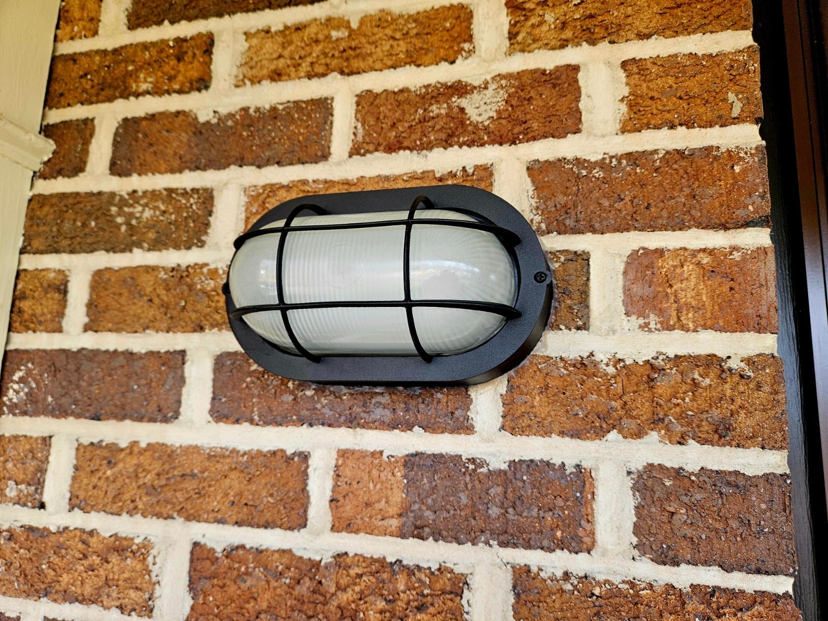 GRUENLICH 8.5'' Oval Outdoor Wall Lights, Dimmable LED Bulkhead Light, Sauna & Exterior Lighting, ETL Rated, 6W 600 Lumen, 3000K Warm White, Black Cast Aluminum, Wall/Ceiling Mount, 1-Pack - Customer Photo 1