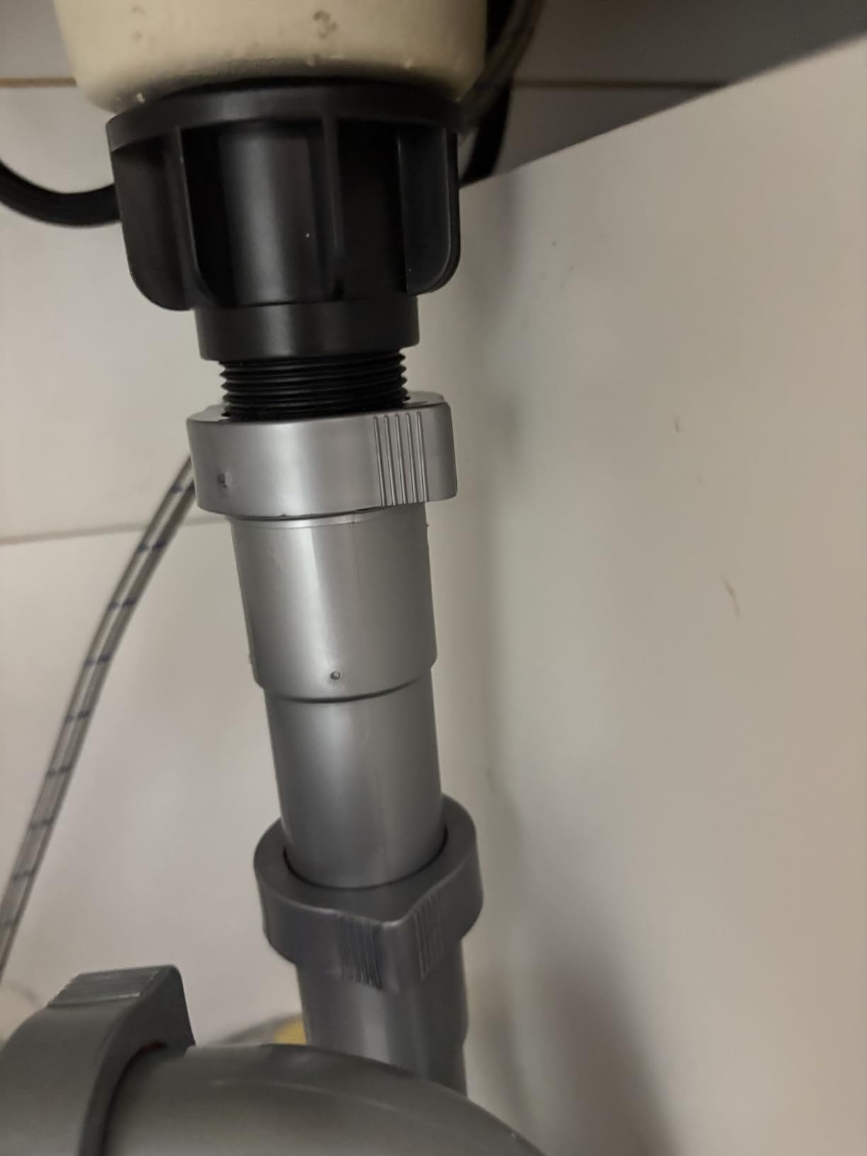 Snappy Trap Universal P Trap Bathroom Sink Drain Kit, No Leaks, Flexible Design, Easy No Tool Installation, 9-13 Inches Flexible Hose Length & 16 Inches Product Length (DK-105 Silver) Customer Review Snappy Trap Universal P Trap Bathroom Sink Drain Kit, No Leaks, Flexible Design, Easy No Tool Installation, 9-13 Inches Flexible Hose Length & 16 Inches Product Length (DK-105 Silver) - Customer Photo 4