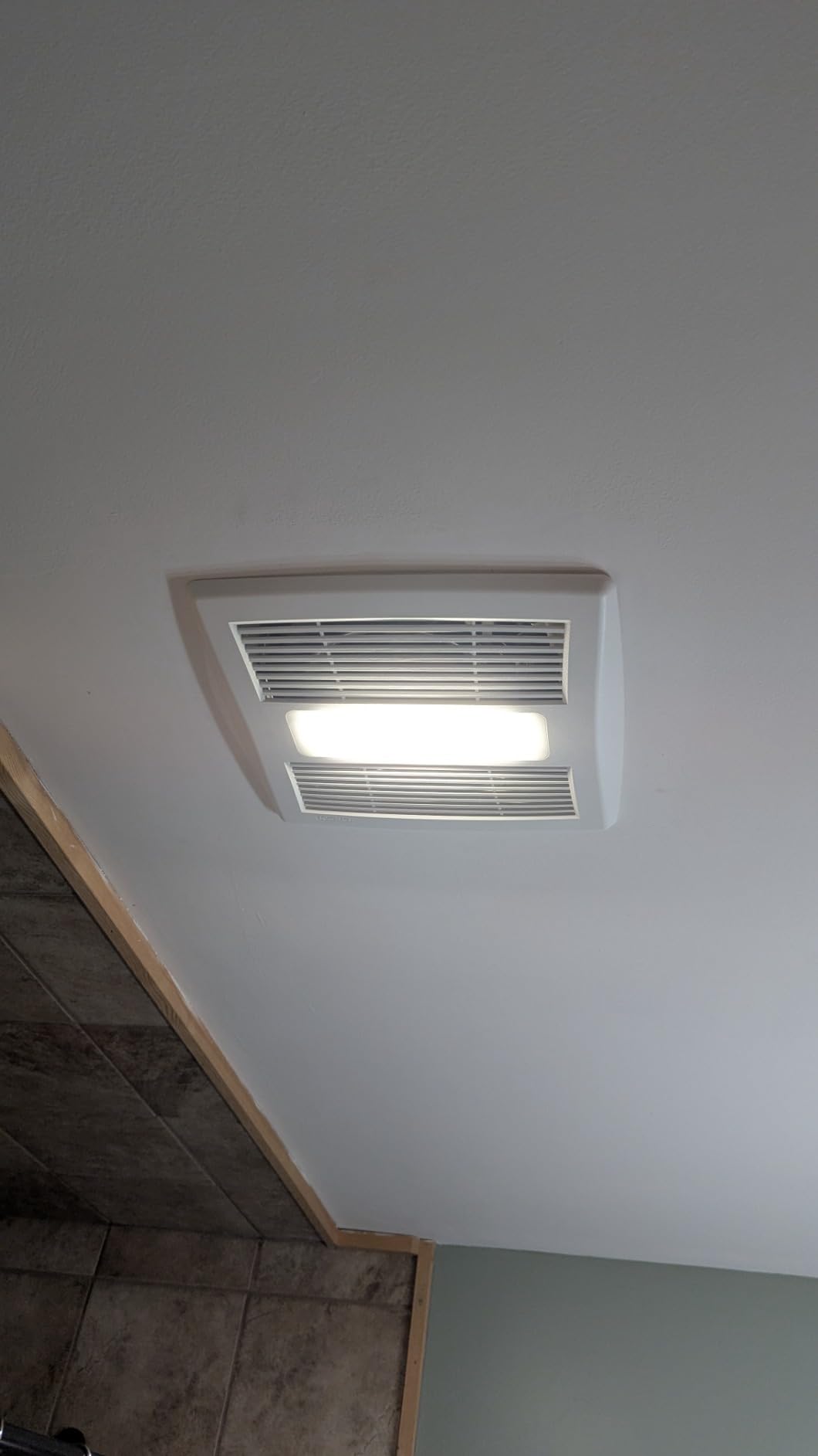 Broan-NuTone Bathroom Exhaust Fan with LED Light and Roomside Installation, ENERGY STAR Certified, 110 CFM, Very Quiet 1.0 Sones White, AE110L - Customer Photo 2