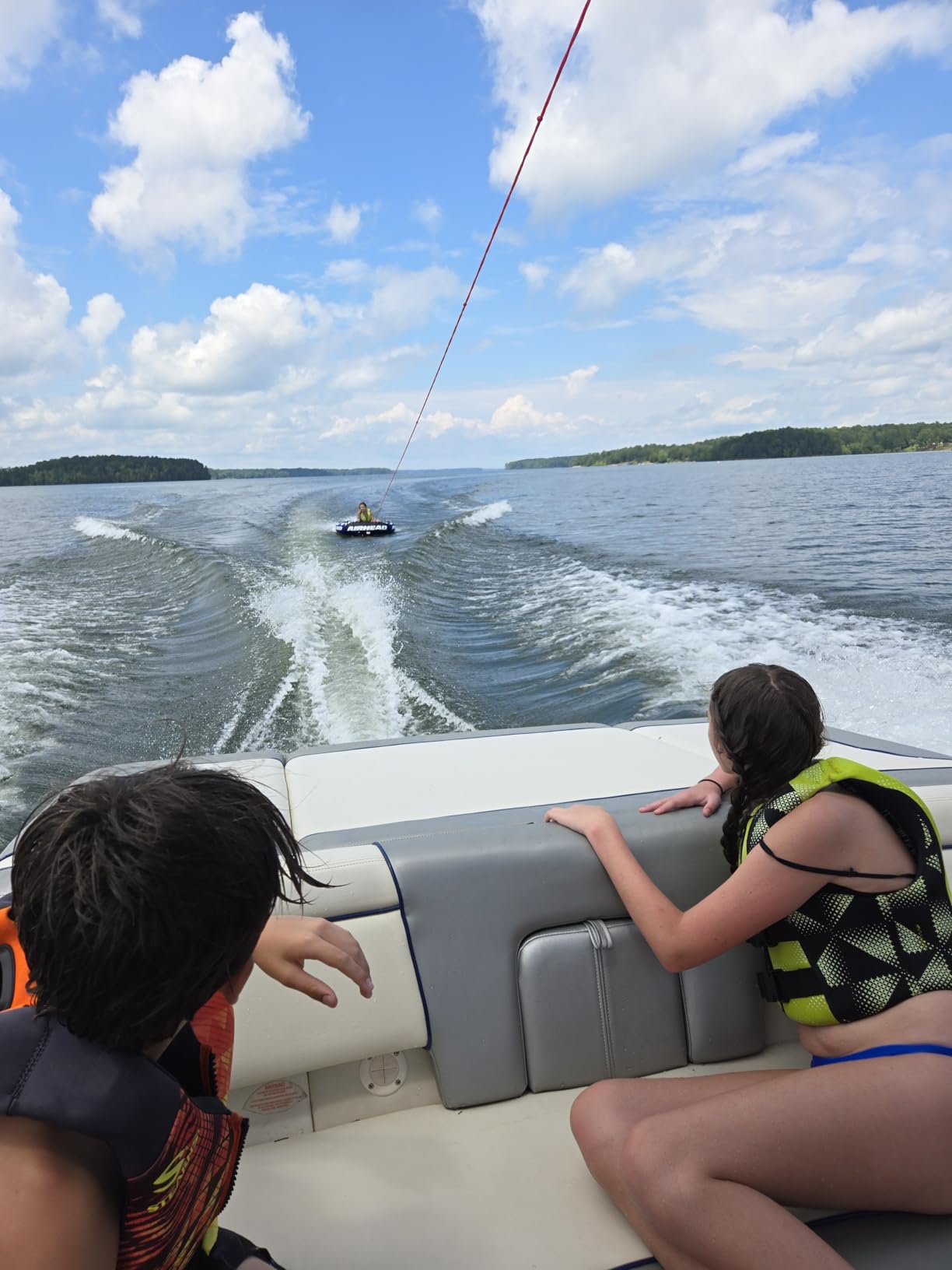 Airhead Slice Towable 2-4 Rider Models, Tube for Boating and Water Sports, Heavy Duty Full Nylon Cover with Zipper, EVA Foam Pads, and Patented Speed Safety Valve for Easy Inflating & Deflating - Customer Photo 3