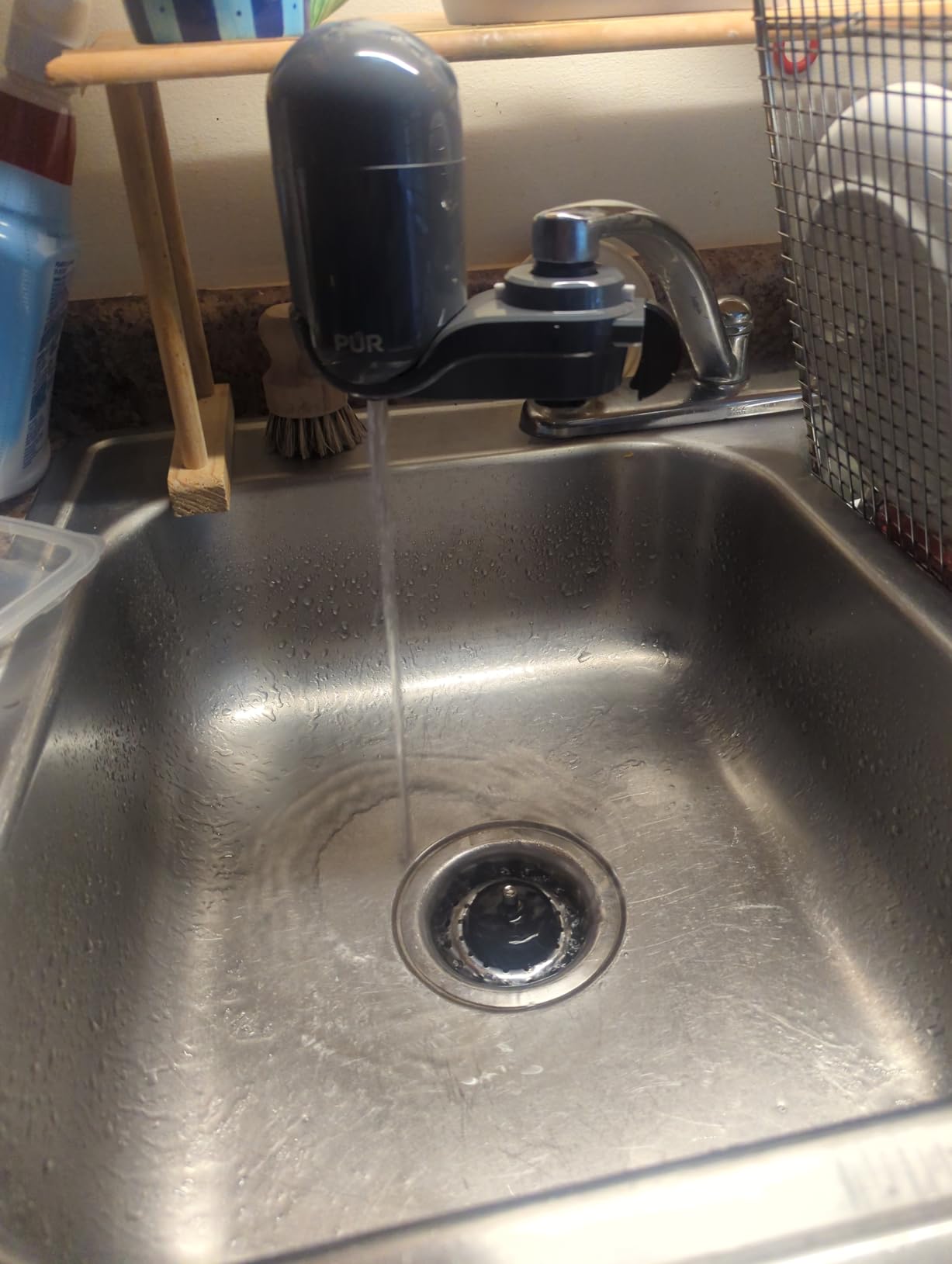 PUR Plus Vertical Faucet Mount Water Filtration System, Lead-Reducing Water Filter For Sink Faucet, Easy Install, 100 Gallons, Compatible with Sinks with External Aerators, Grey Customer Review PUR Plus Vertical Faucet Mount Water Filtration System, Lead-Reducing Water Filter For Sink Faucet, Easy Install, 100 Gallons, Compatible with Sinks with External Aerators, Grey - Customer Photo 1