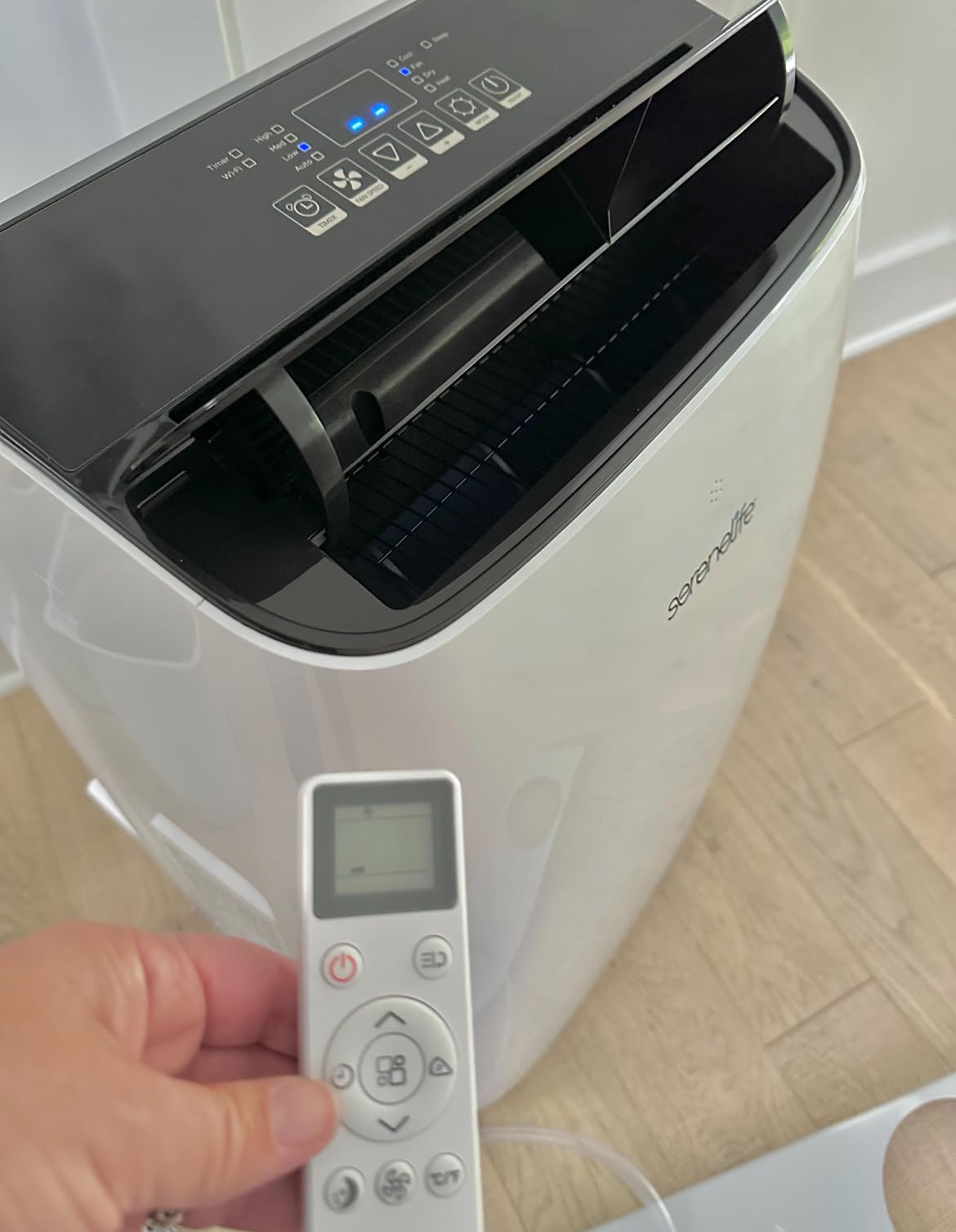 SereneLife Small Air Conditioner Portable 14,000 BTU with Built-in Dehumidifier - Portable AC unit for rooms up to 650 sq ft - Remote Control, Window Mount Exhaust Kit Customer Review SereneLife Small Air Conditioner Portable 14,000 BTU with Built-in Dehumidifier - Portable AC unit for rooms up to 650 sq ft - Remote Control, Window Mount Exhaust Kit - Customer Photo 2