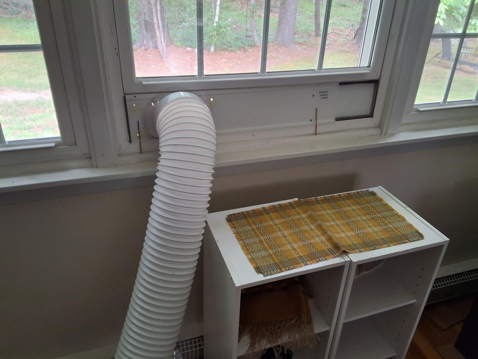 Frigidaire FHPW142AC1 Portable Air Conditioner, 14K BTU (ASHRAE) / 10K BTU (DOE) with Multi-Speed Fan/Dehumidifier Mode/Built-in Air Ionizer/Washable Filter/Works with Alexa/Wi-Fi Connected, in White Customer Review Frigidaire FHPW142AC1 Portable Air Conditioner, 14K BTU (ASHRAE) / 10K BTU (DOE) with Multi-Speed Fan/Dehumidifier Mode/Built-in Air Ionizer/Washable Filter/Works with Alexa/Wi-Fi Connected, in White - Customer Photo 3