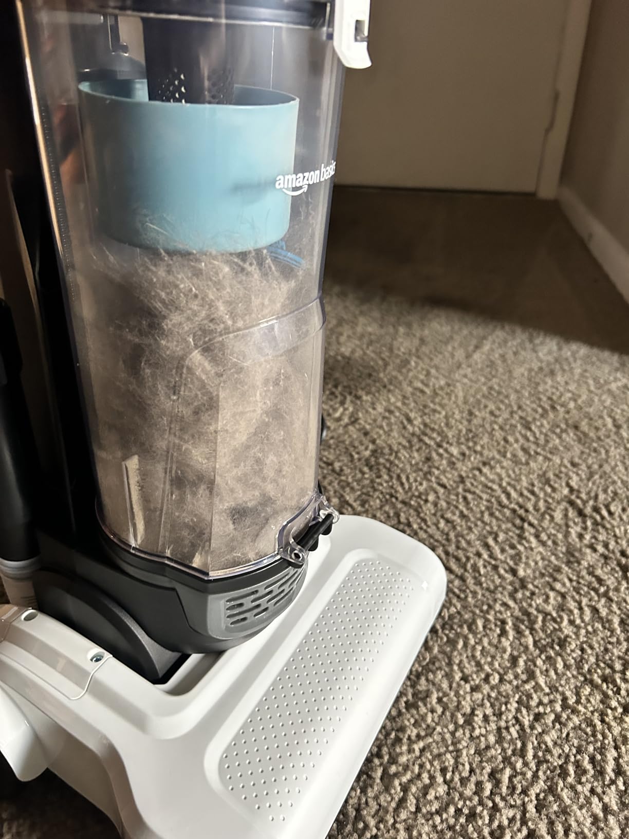 Amazon Basics Upright Bagless Vacuum Cleaner for Carpet and Hard Floors, With Crevice and Upholstery Tools, Detachable Handle, Lightweight (8.4 lbs), 1.7L Dust Cup, 720W, 25ft Cord, Black/White - Customer Photo 1