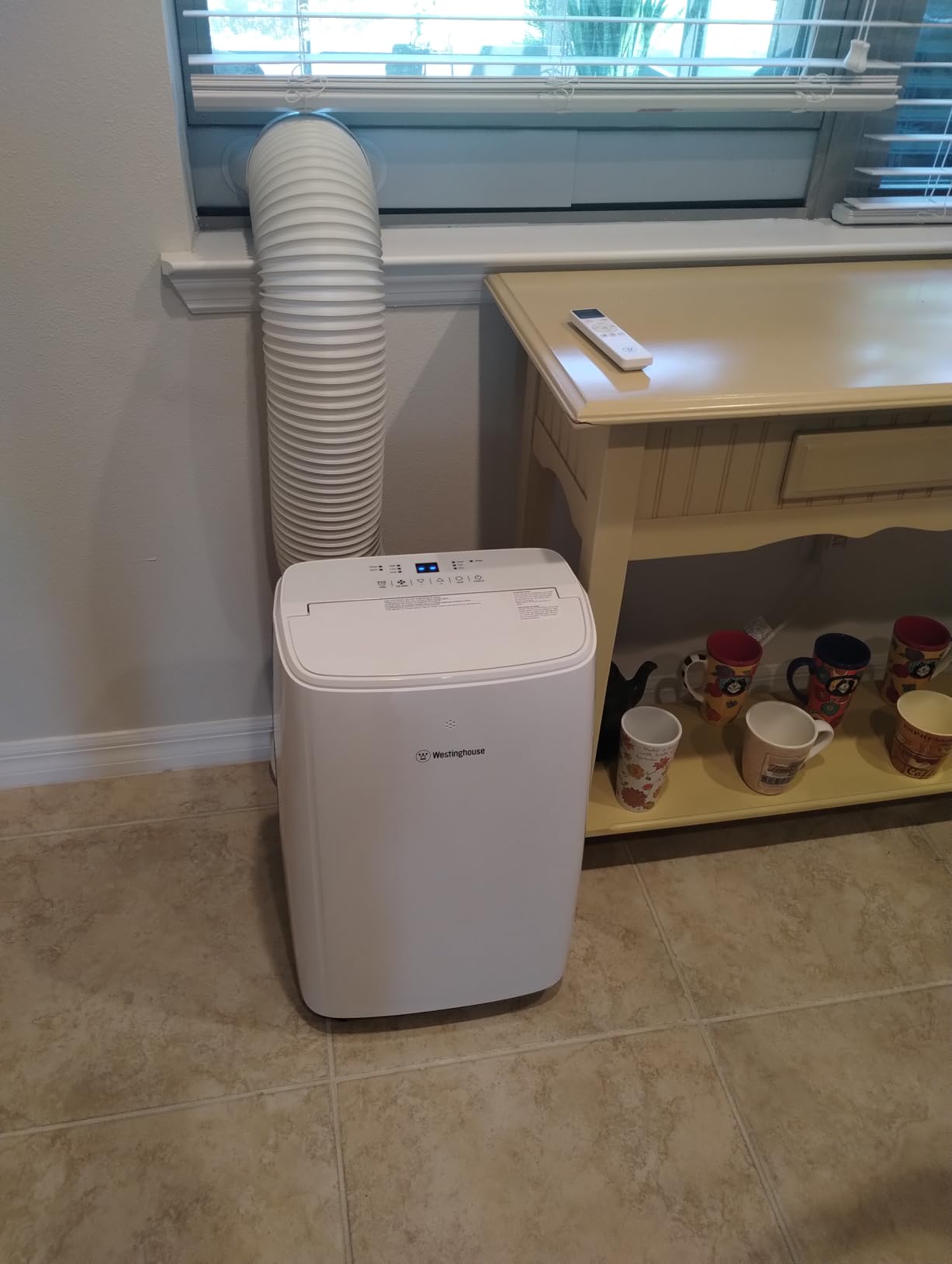 Westinghouse 14,000 BTU Air Conditioner with Heat Mode, Cools 700 sq. ft., WiFi Enabled, Remote Controlled, Dehumidifier, 3-Speed Fan, Programmable Timer, Window Kit Customer Review Westinghouse 14,000 BTU Air Conditioner with Heat Mode, Cools 700 sq. ft., WiFi Enabled, Remote Controlled, Dehumidifier, 3-Speed Fan, Programmable Timer, Window Kit - Customer Photo 2