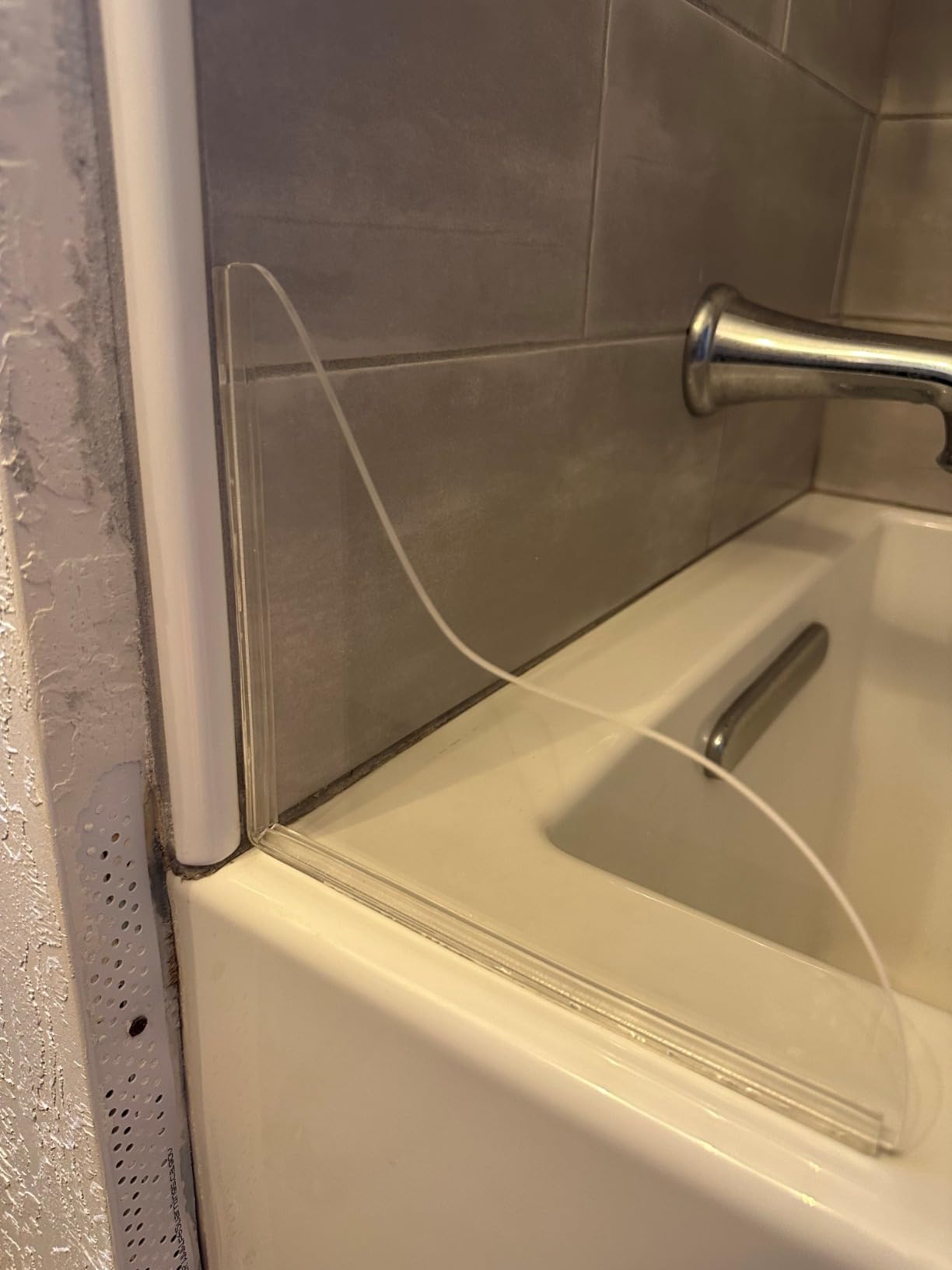 UIOCSSC Shower Splash Guard, 2 Pack Bathtub Shower Water Splash Guards Silicone Bathtub Splash Guard Self-Adhesive Waterproof Shower Guards to Keep Water in Shower Customer Review UIOCSSC Shower Splash Guard, 2 Pack Bathtub Shower Water Splash Guards Silicone Bathtub Splash Guard Self-Adhesive Waterproof Shower Guards to Keep Water in Shower - Customer Photo 2