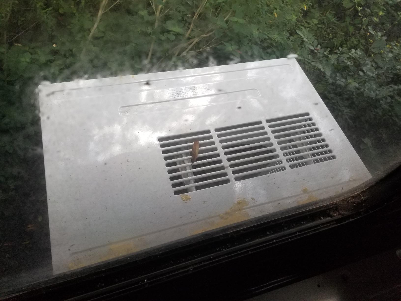 Amana 12,000 BTU Window Air Conditioner, 115V, Cools up to 550 Sq. Ft. for Bedroom, Living Room, Kitchen, with Remote Control, 24H Timer, 3-Speed, Auto-Restart, Digital Display, White Customer Review Amana 12,000 BTU Window Air Conditioner, 115V, Cools up to 550 Sq. Ft. for Bedroom, Living Room, Kitchen, with Remote Control, 24H Timer, 3-Speed, Auto-Restart, Digital Display, White - Customer Photo 1