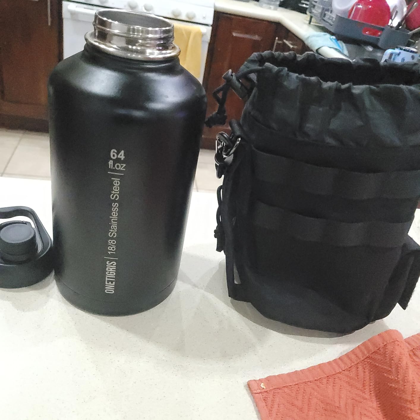 OneTigris Tactical Half Gallon Water Bottle with Straw - 64 oz Vacuum Insulated Stainless Steel Water Jug, Leakproof Sport Bottle with 3 BPA Free Lids, Paracord Handle & MOLLE Water Pouch for Outdoor - Customer Photo 1