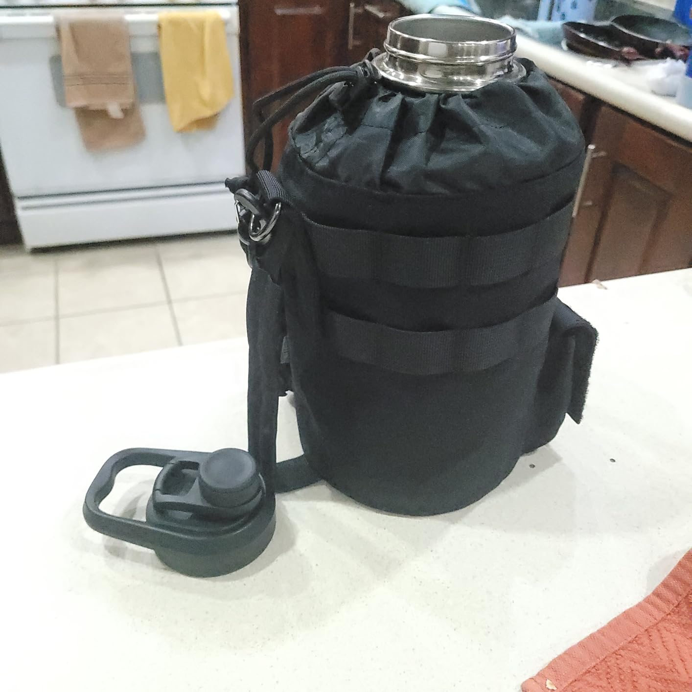 OneTigris Tactical Half Gallon Water Bottle with Straw - 64 oz Vacuum Insulated Stainless Steel Water Jug, Leakproof Sport Bottle with 3 BPA Free Lids, Paracord Handle & MOLLE Water Pouch for Outdoor - Customer Photo 2