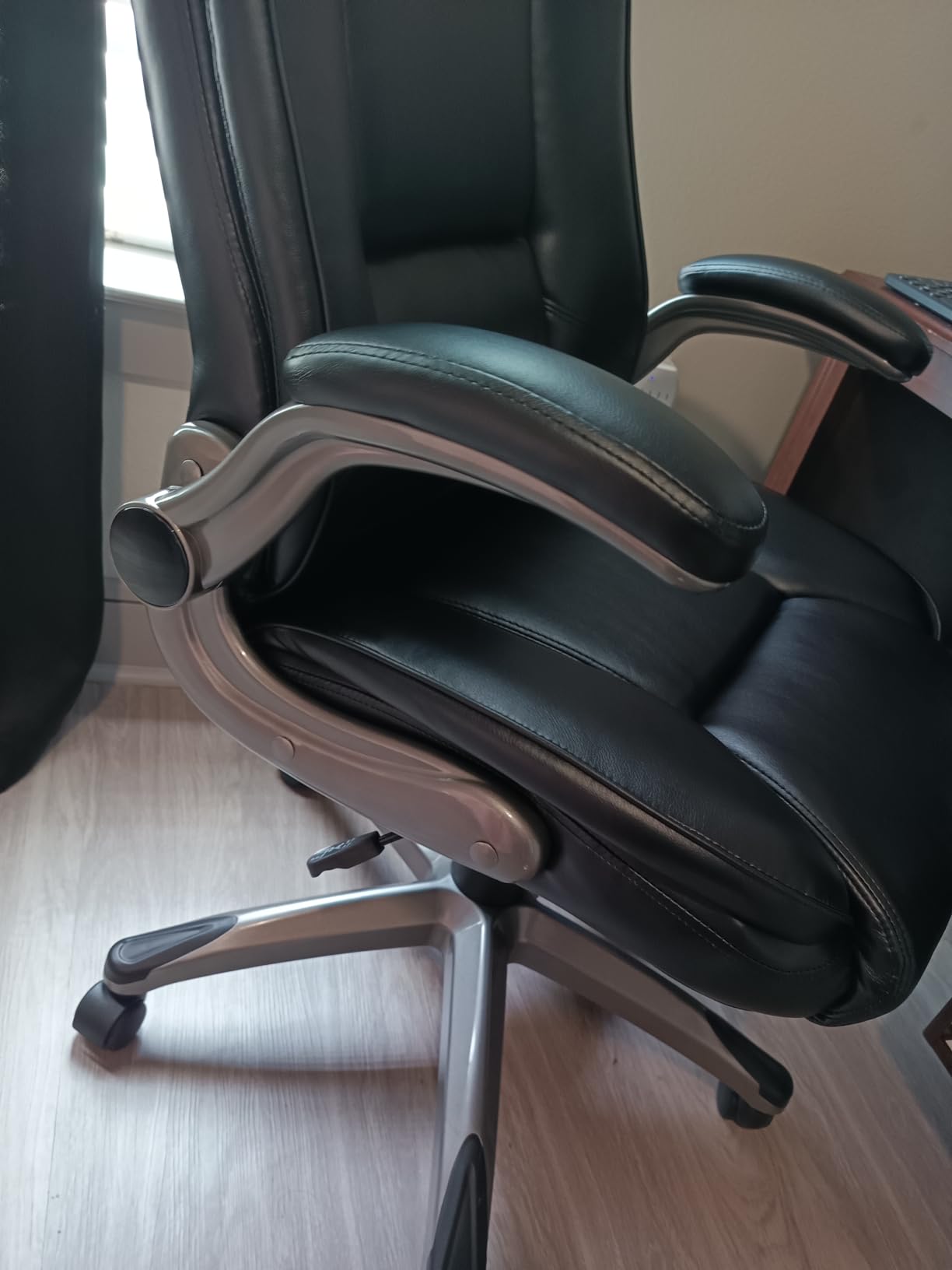 COLAMY Leather Executive Office Chair - High Back Home Computer Desk Chair with Padded Flip-up Arms, Adjustable Tilt Lock, Swivel Rolling Ergonomic Chair for Adult Working Study, Black - Customer Photo 2