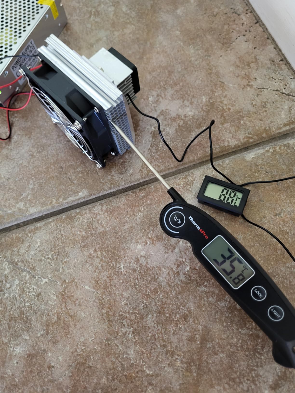 Mini Air Conditioner DC 12V DIY Thermoelectric Peltier Refrigeration Cooling System Heat Sink + 12V 78W Switch Power Supply Driver + Thermometer with Probe Customer Review Mini Air Conditioner DC 12V DIY Thermoelectric Peltier Refrigeration Cooling System Heat Sink + 12V 78W Switch Power Supply Driver + Thermometer with Probe - Customer Photo 1