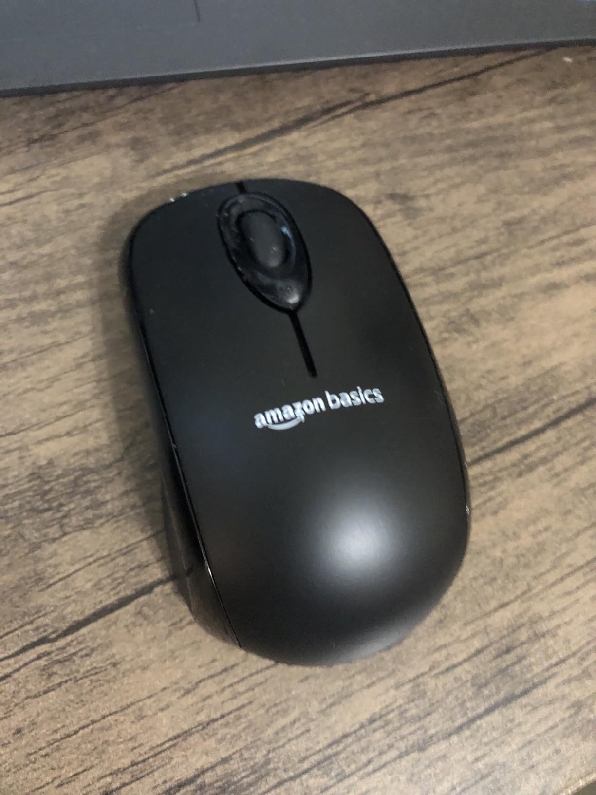 Amazon Basics 2.4 GHz Wireless Optical Computer Mouse with USB Nano Receiver, Portable, No Wires, Smooth Tracking, Multi-Device Compatibility, Black customer photo 2