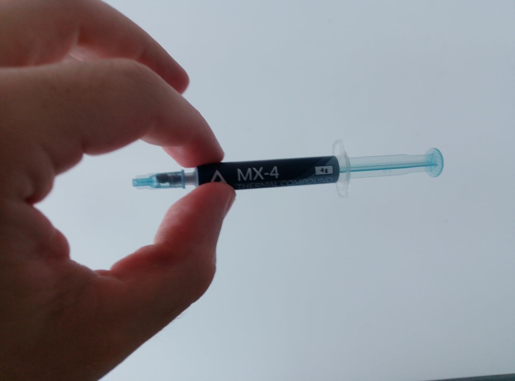 ARCTIC MX-4 (4 g) - Premium Performance Thermal Paste for All Processors (CPU, GPU - PC, PS4, Xbox), Very high Thermal Conductivity, Long Durability, Safe Application, Non-Conductive, Non-capacitive customer photo 1