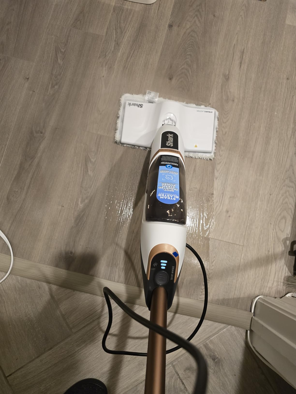 Shark Steam Mop with 2 Machine Washable Dirt Grip Pads, Removable Water Tank, Lightweight, Steam Cleaner for sealed Hard Floors, Marble, Stone, Hardwood, Tile, Laminate, White/Seafoam, S1000 Customer Review Shark Steam Mop with 2 Machine Washable Dirt Grip Pads, Removable Water Tank, Lightweight, Steam Cleaner for sealed Hard Floors, Marble, Stone, Hardwood, Tile, Laminate, White/Seafoam, S1000 - Customer Photo 1