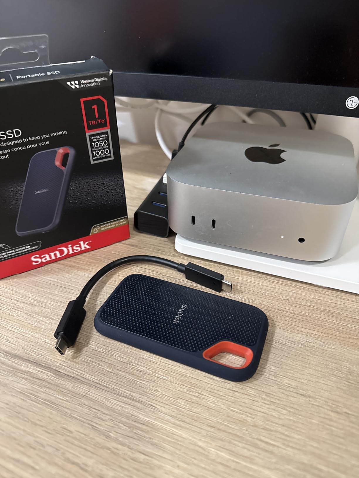 SanDisk 1TB Extreme Portable SSD - Up to 1050MB/s, USB-C, USB 3.2 Gen 2, IP65 Water and Dust Resistance, Updated Firmware - External Solid State Drive - SDSSDE61-1T00-G25 customer photo 2