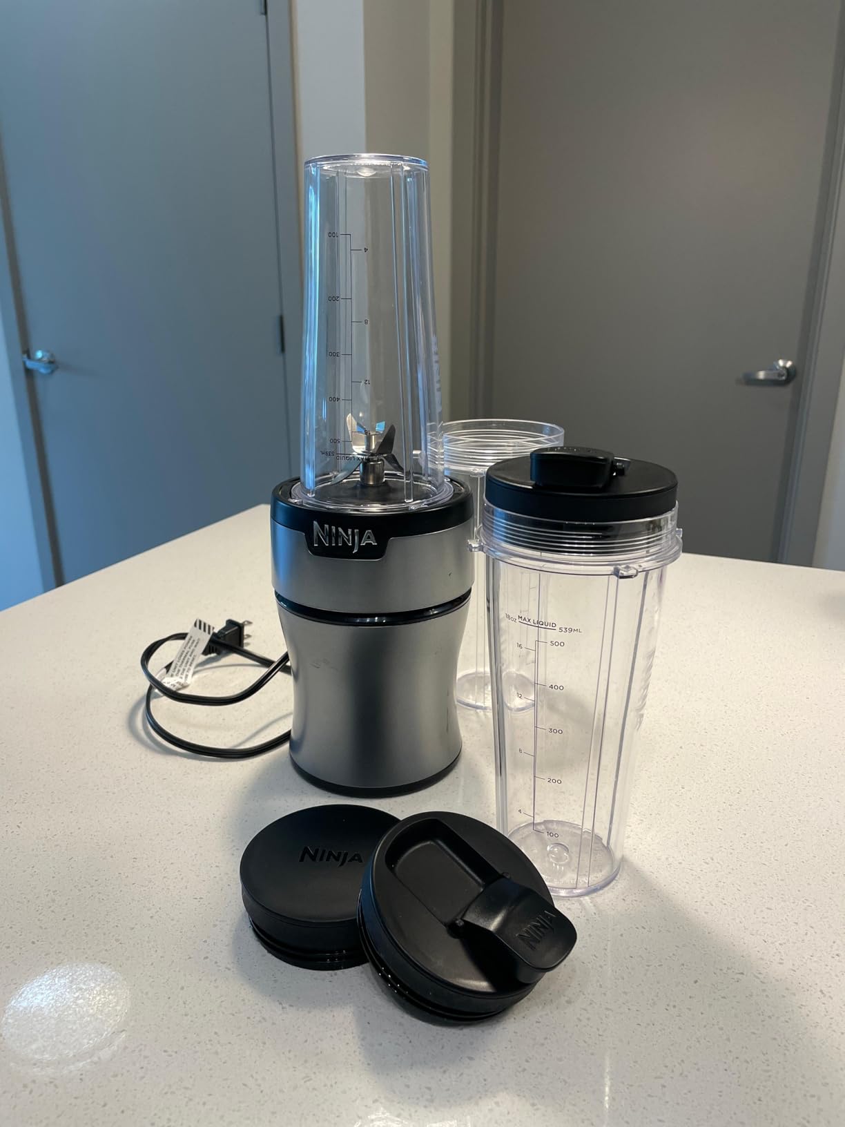 Ninja Nutri Pro Blender | Single Serve | For Smoothies, Salsa, Shakes and Frozen Drinks | Includes 2 Smoothie Cups & Lids | Crushes Ice, Fruit & Veggies | Silver | BN401 - Customer Photo 1