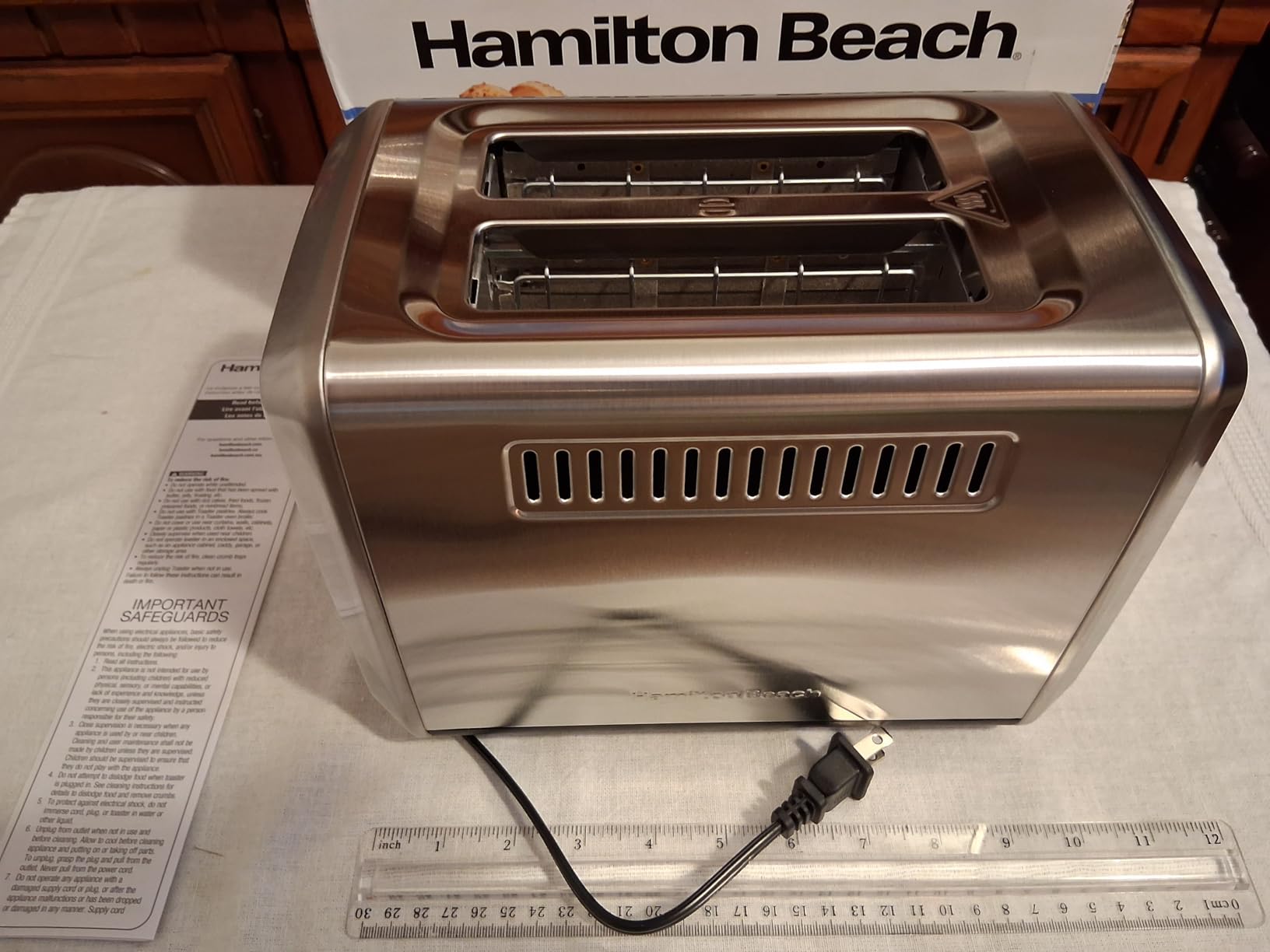 Hamilton Beach 2 Slice Toaster with Extra-Wide Slots, Bagel Setting, Toast Boost, Slide-Out Crumb Tray, Auto-Shutoff & Cancel Button, Defrost Function, Stainless Steel (22794) Customer Review Hamilton Beach 2 Slice Toaster with Extra-Wide Slots, Bagel Setting, Toast Boost, Slide-Out Crumb Tray, Auto-Shutoff & Cancel Button, Defrost Function, Stainless Steel (22794) - Customer Photo 1