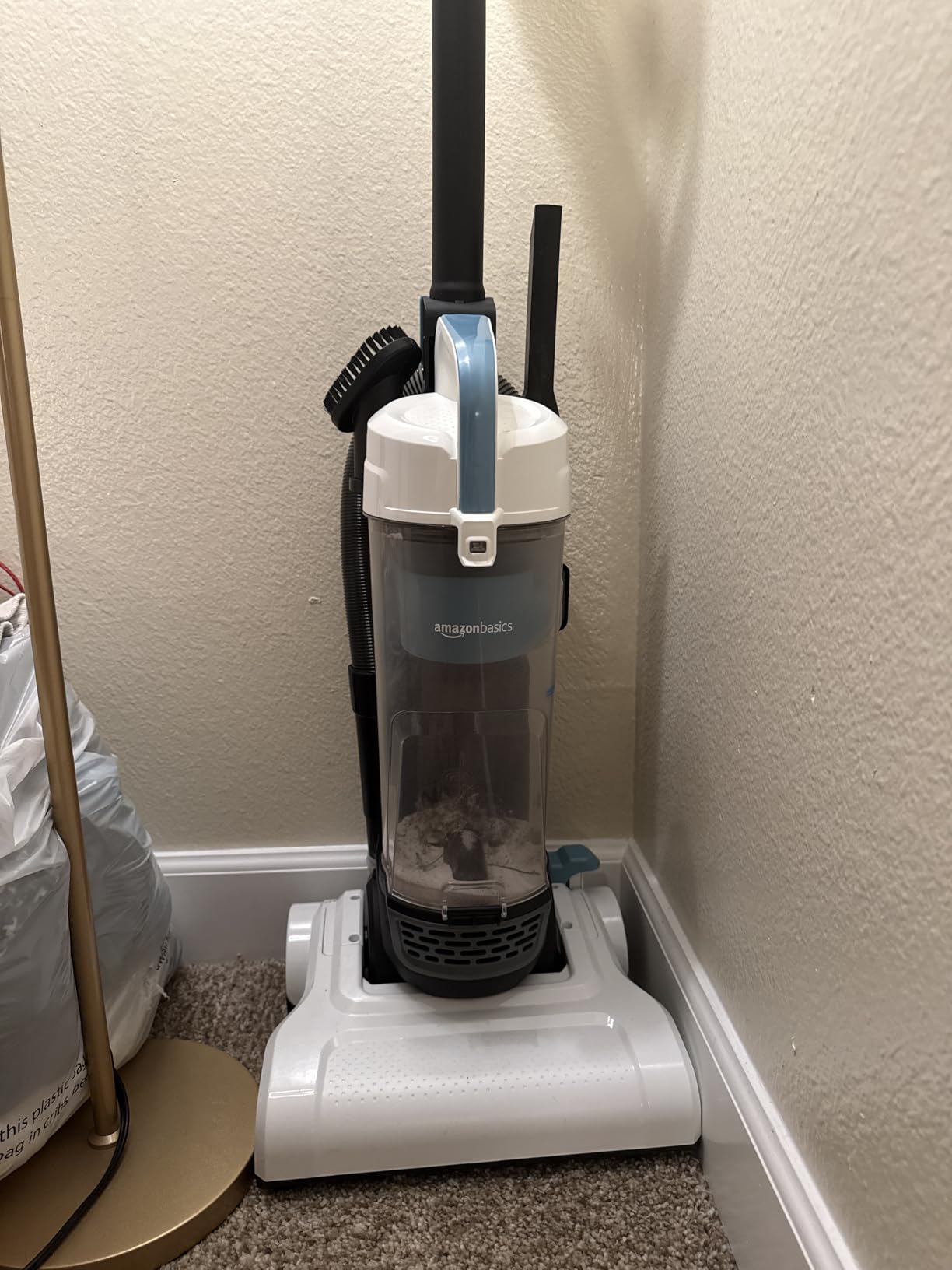 Amazon Basics Upright Bagless Vacuum Cleaner for Carpet and Hard Floors, With Crevice and Upholstery Tools, Detachable Handle, Lightweight (8.4 lbs), 1.7L Dust Cup, 720W, 25ft Cord, Black/White Customer Review Amazon Basics Upright Bagless Vacuum Cleaner for Carpet and Hard Floors, With Crevice and Upholstery Tools, Detachable Handle, Lightweight (8.4 lbs), 1.7L Dust Cup, 720W, 25ft Cord, Black/White - Customer Photo 2